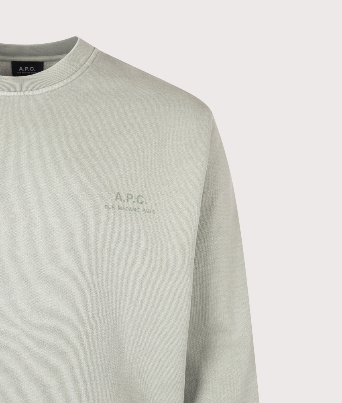 A.P.C. Loose Fit Fernando GOTS Sweatshirt in Grey Green at EQVVS Menswear. Detail shot.