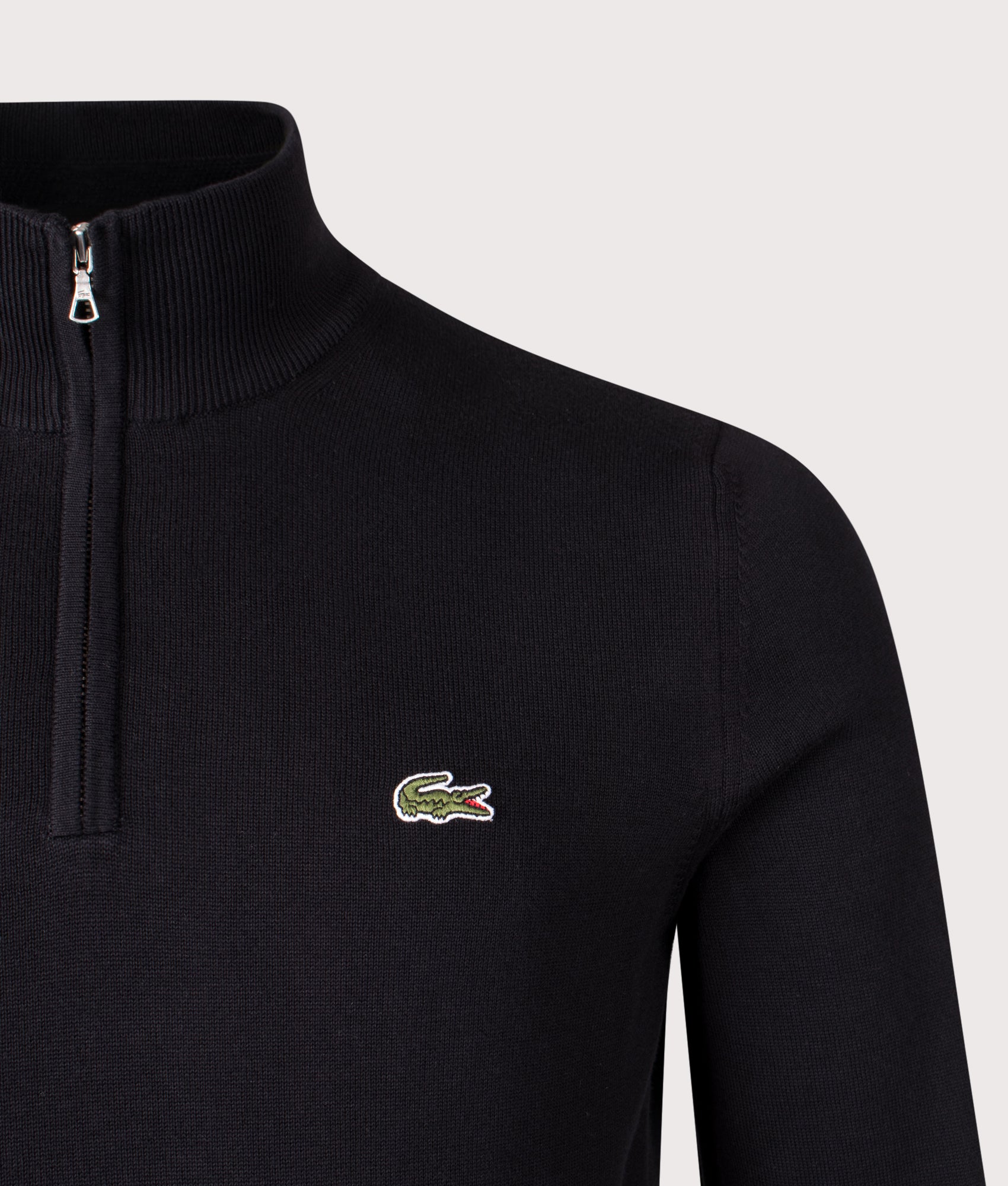 Lacoste Quarter Zip Knit in Black at EQVVS Menswear. Detail shot.