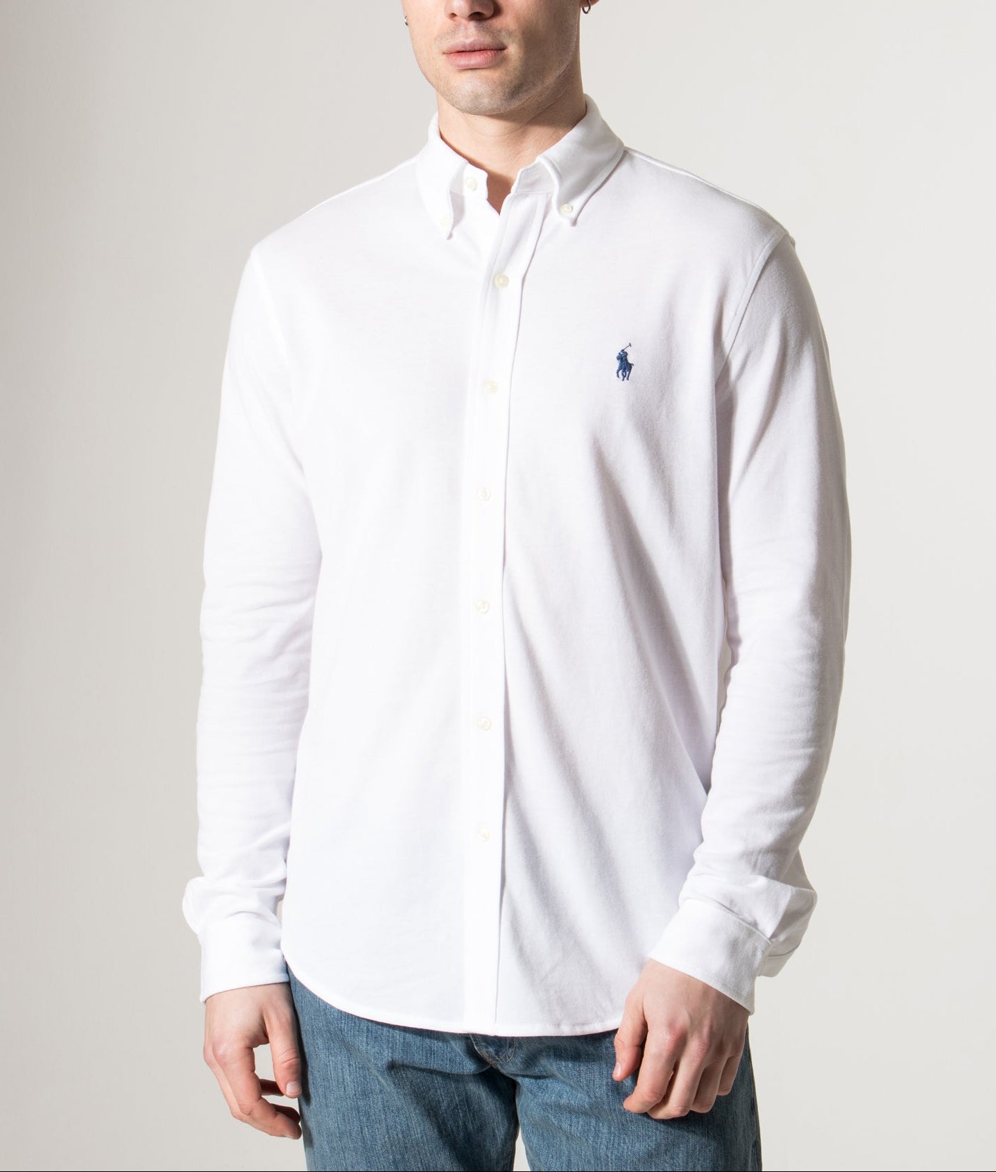 Polo Ralph Lauren Relaxed Fit Featherweight Mesh Shirt in White at EQVVS Menswear. Model front shot.
