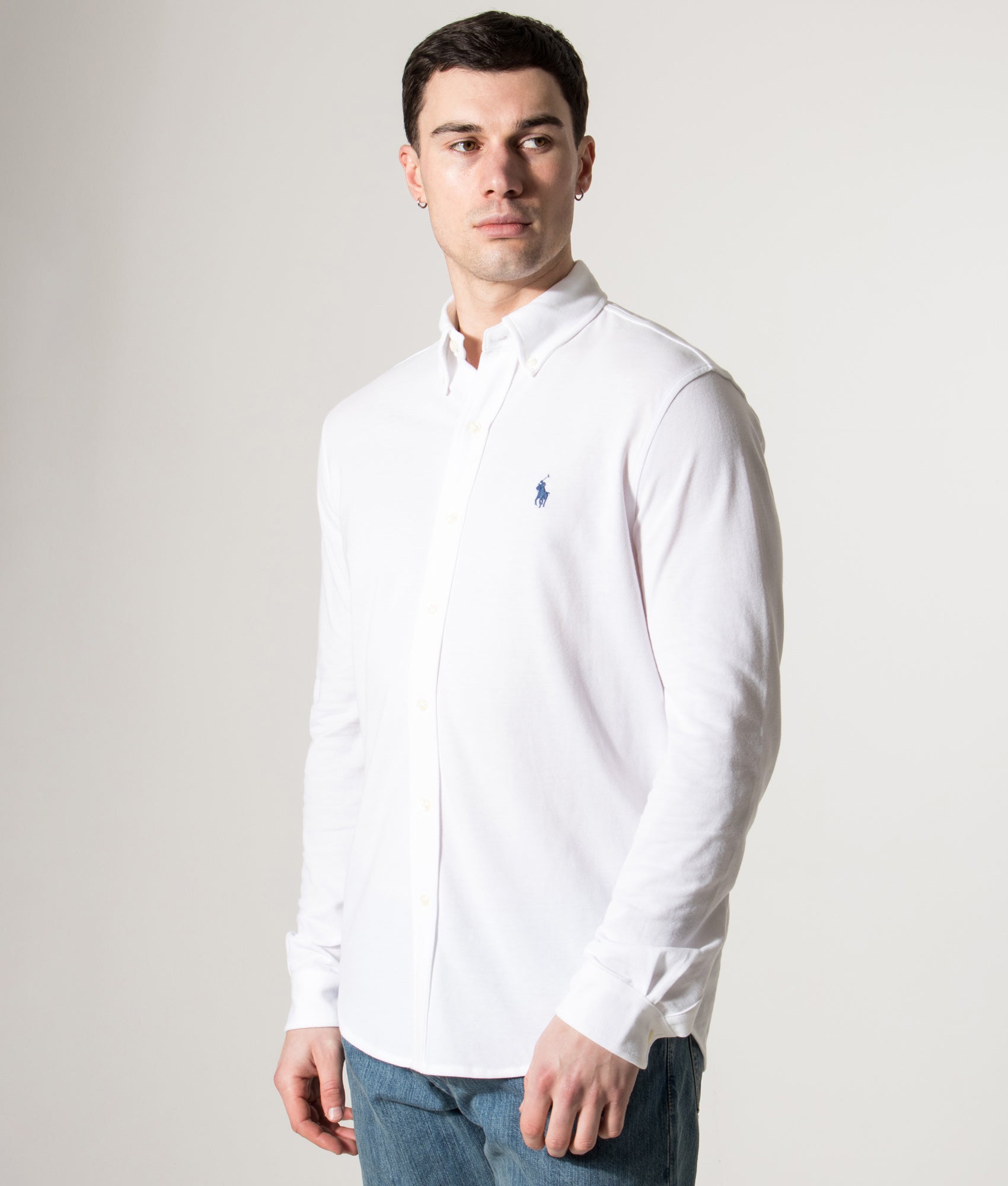 Polo Ralph Lauren Relaxed Fit Featherweight Mesh Shirt in White at EQVVS Menswear. Angled model front shot.