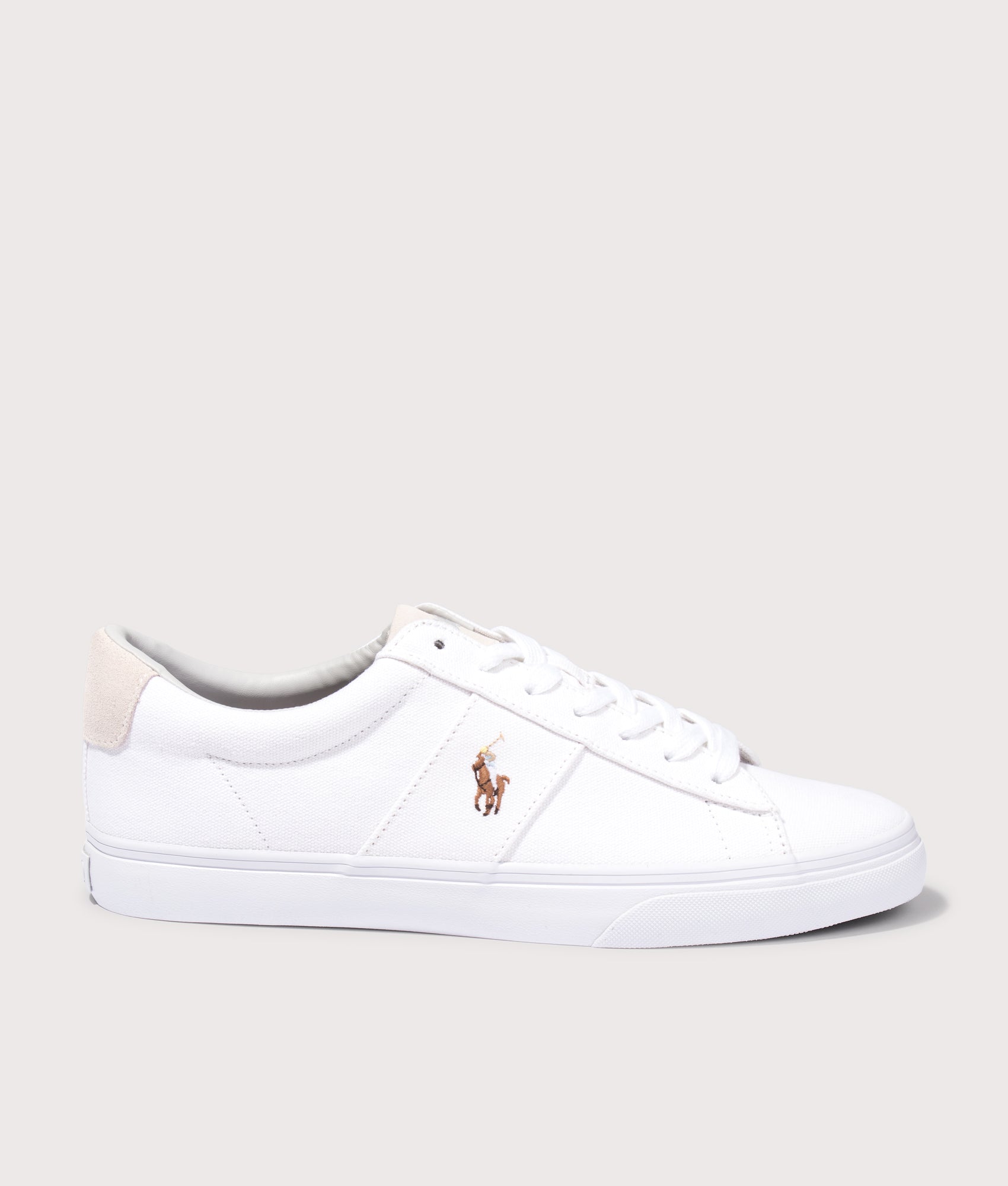 Polo Ralph Lauren Sayer Canvas Sneakers in White at EQVVS Menswear. Side shot.