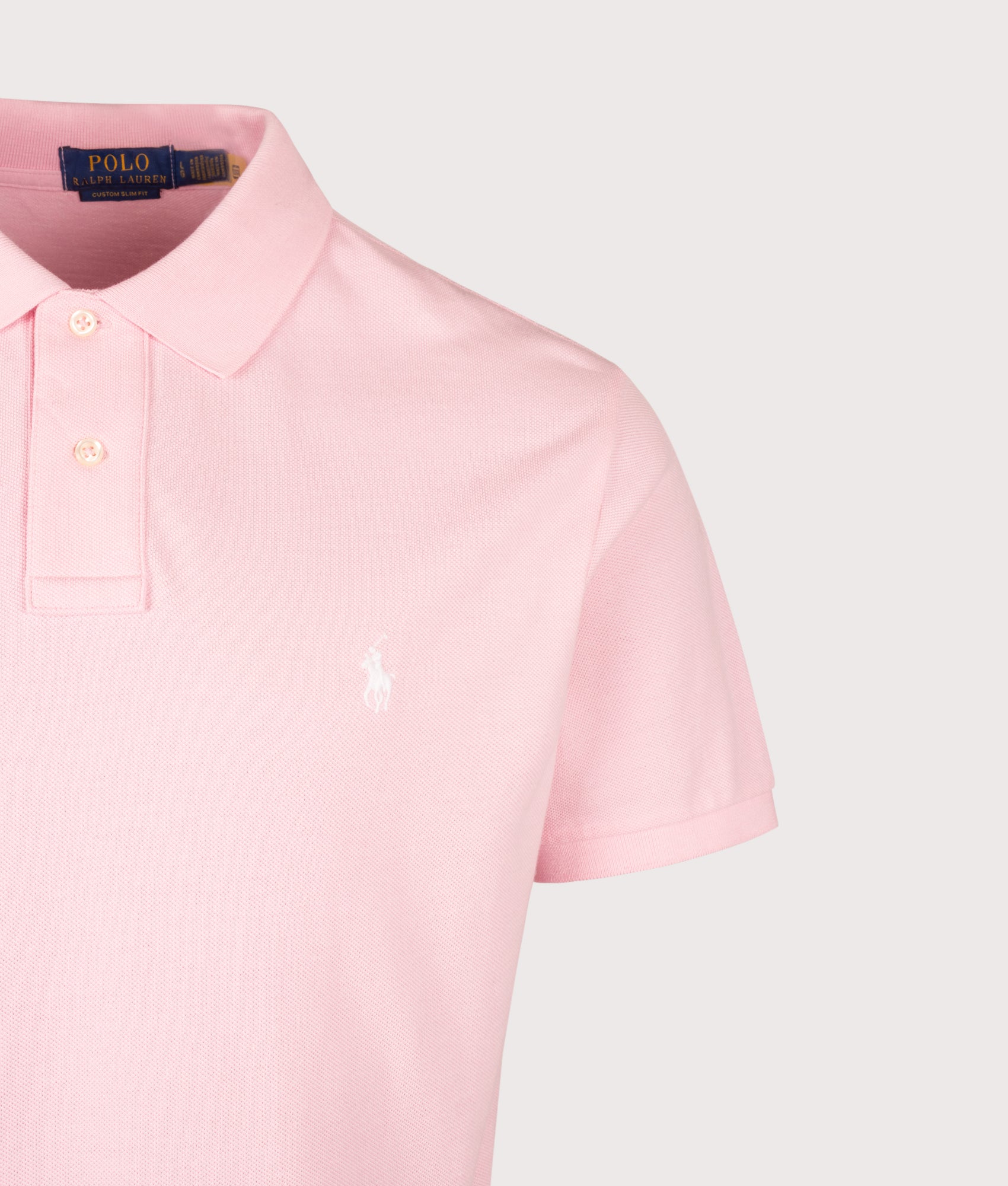 Polo Ralph Lauren Custom Slim Fit Mesh Polo Shirt in Garden Pink at EQVVS Menswear. Detail shot.