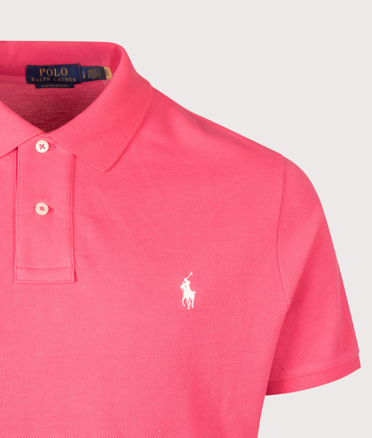 Polo Ralph Lauren Custom Slim Fit Mesh Polo Shirt in Hot Pink at EQVVS Menswear. Detail shot.