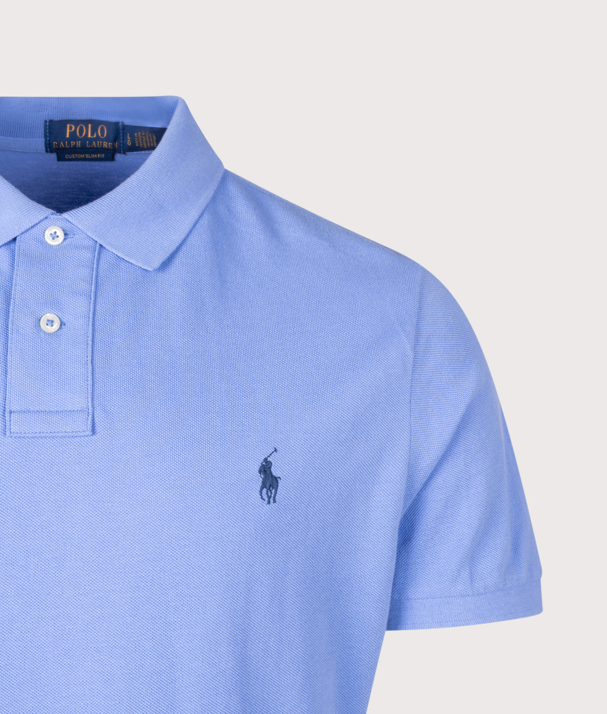 Polo Ralph Lauren Custom Slim Fit Mesh Polo Shirt in Harbor Island Blue at EQVVS Menswear. Detail shot.