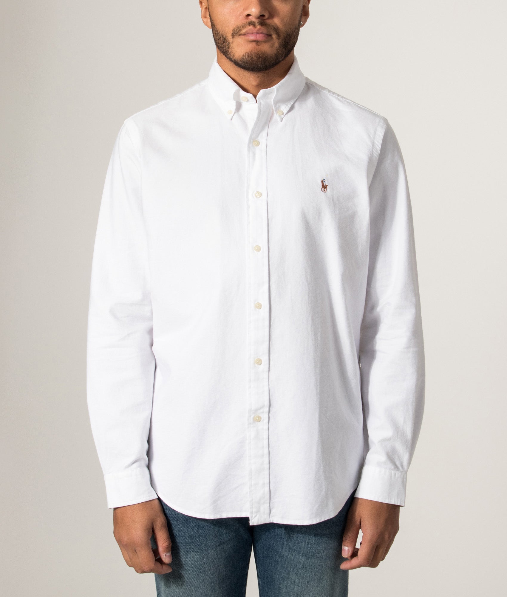 Polo Ralph Lauren Custom Fit Oxford Shirt in White at EQVVS Menswear. Model front shot.