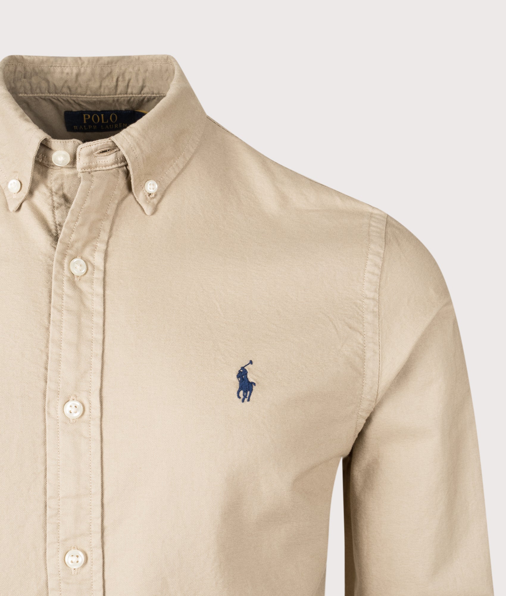 Polo Ralph Lauren Slim Fit Garment-Dyed Oxford Shirt in the Surrey Tan at EQVVS Menswear. Detail shot.