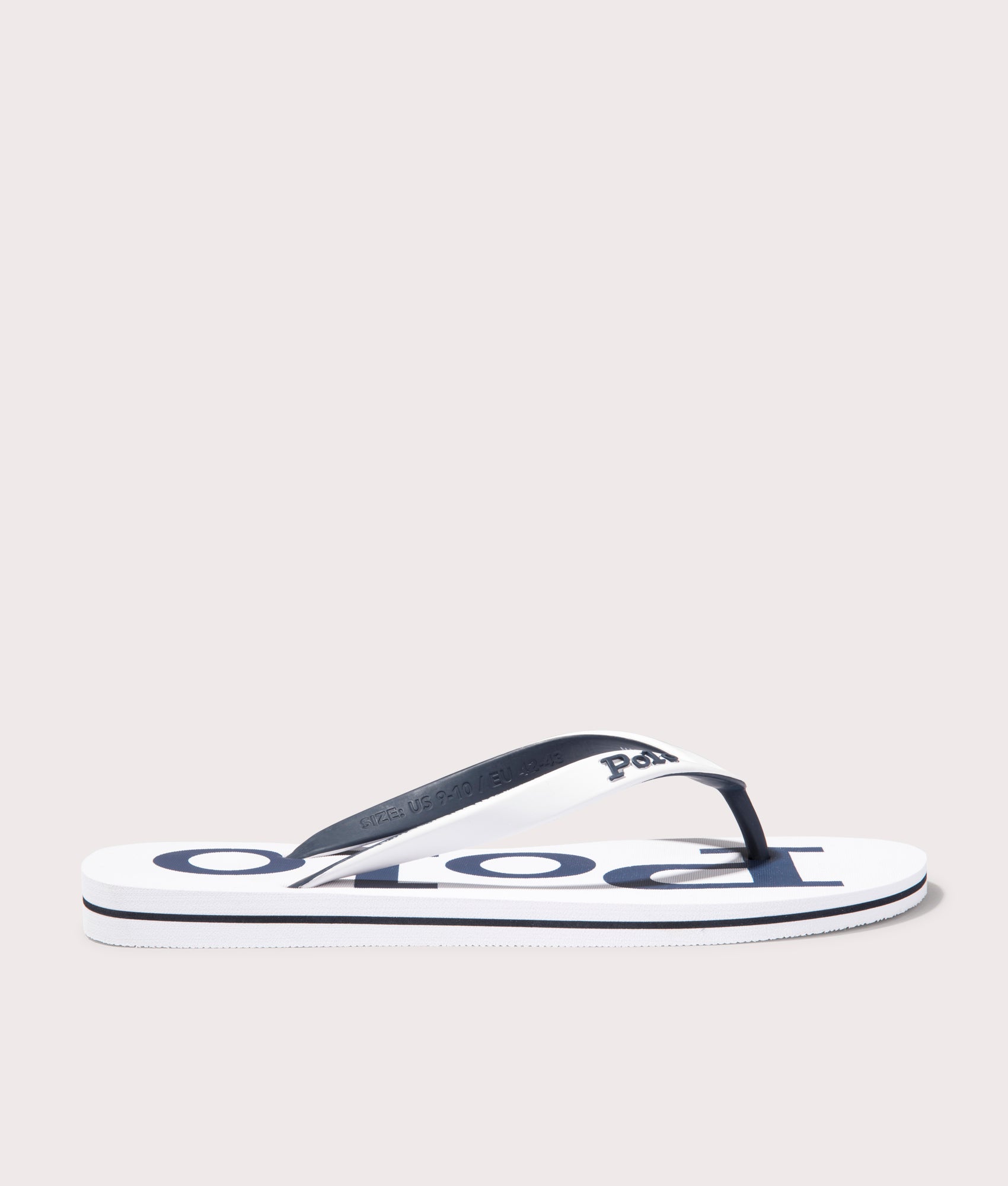 Polo Ralph Lauren Bolt Logo Flip Flops in White/Newport Navy. Shot at EQVVS.  Side shot 