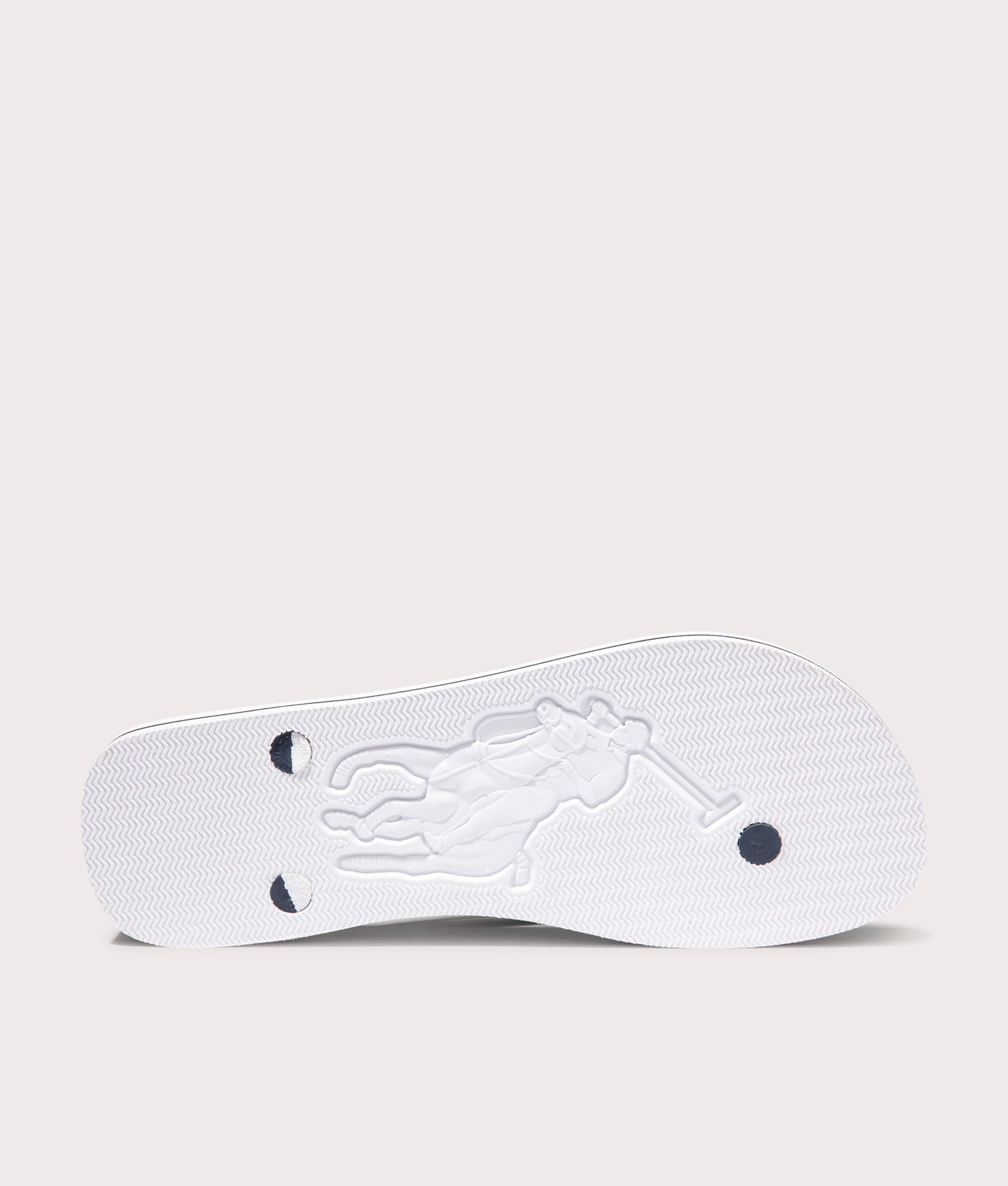 Polo Ralph Lauren Bolt Logo Flip Flops in White/Newport Navy. Shot at EQVVS. Sole shot 