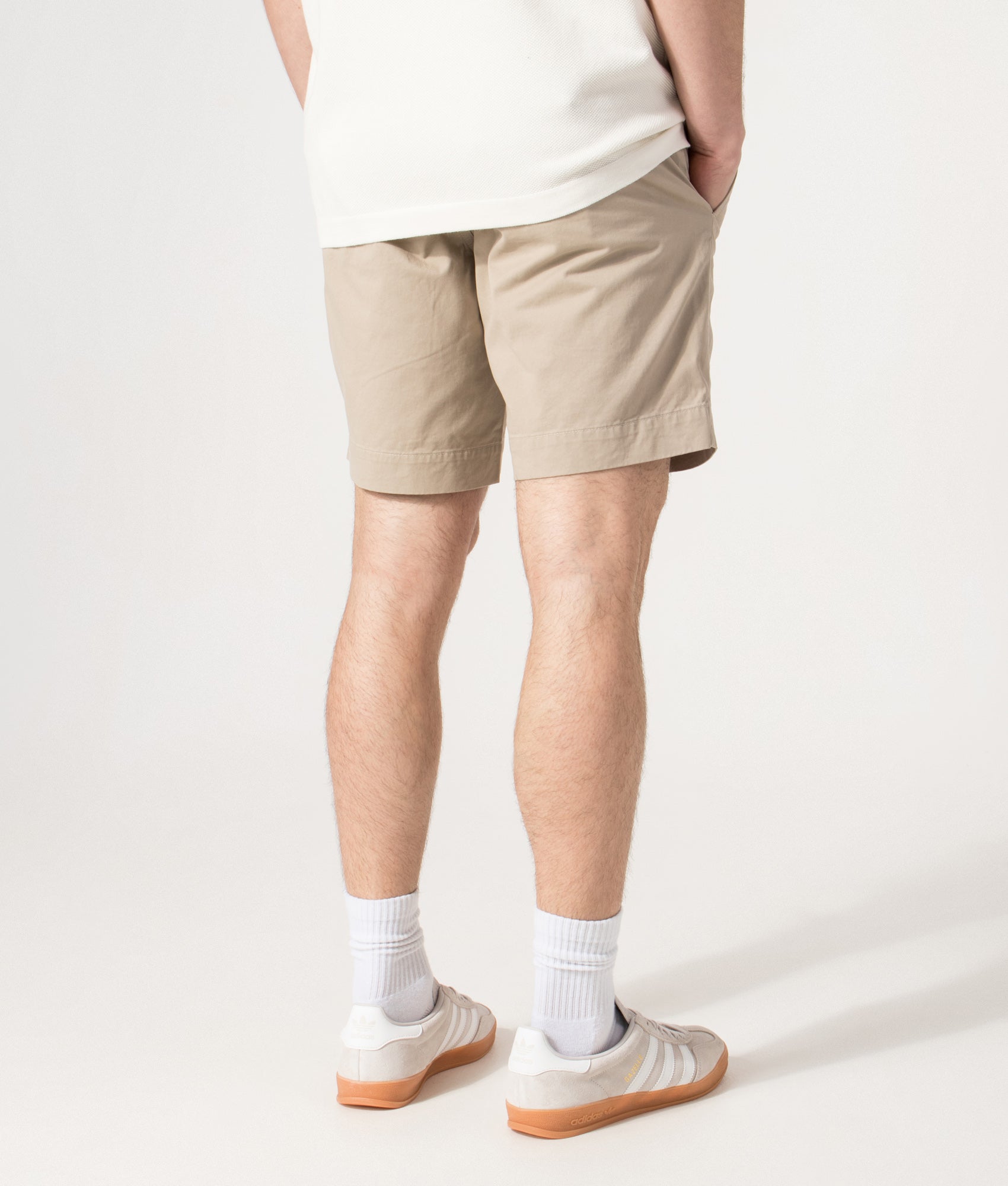 Polo Ralph Lauren Regular Fit Bedford Stretch Chino Shorts in Khaki Tan at EQVVS Menswear. Angled model back shot.