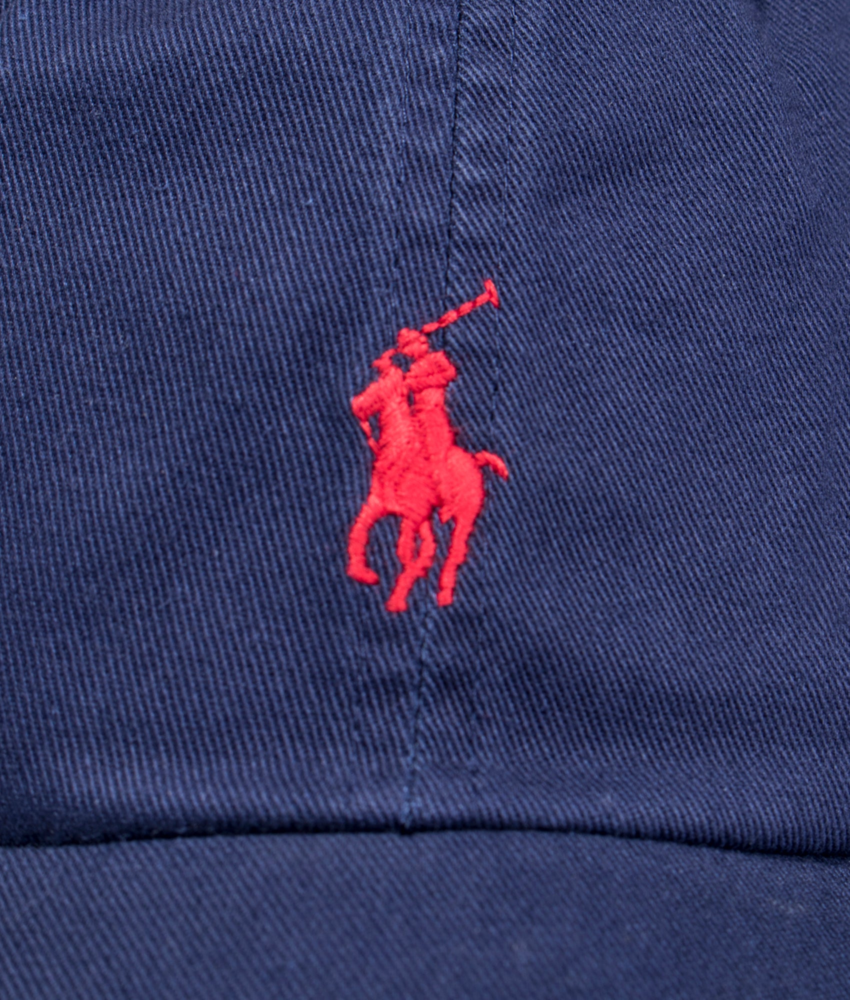 Polo Ralph Lauren Cotton Chino Baseball Cap in Newport Navy and Red at EQVVS Menswear. Detail shot.