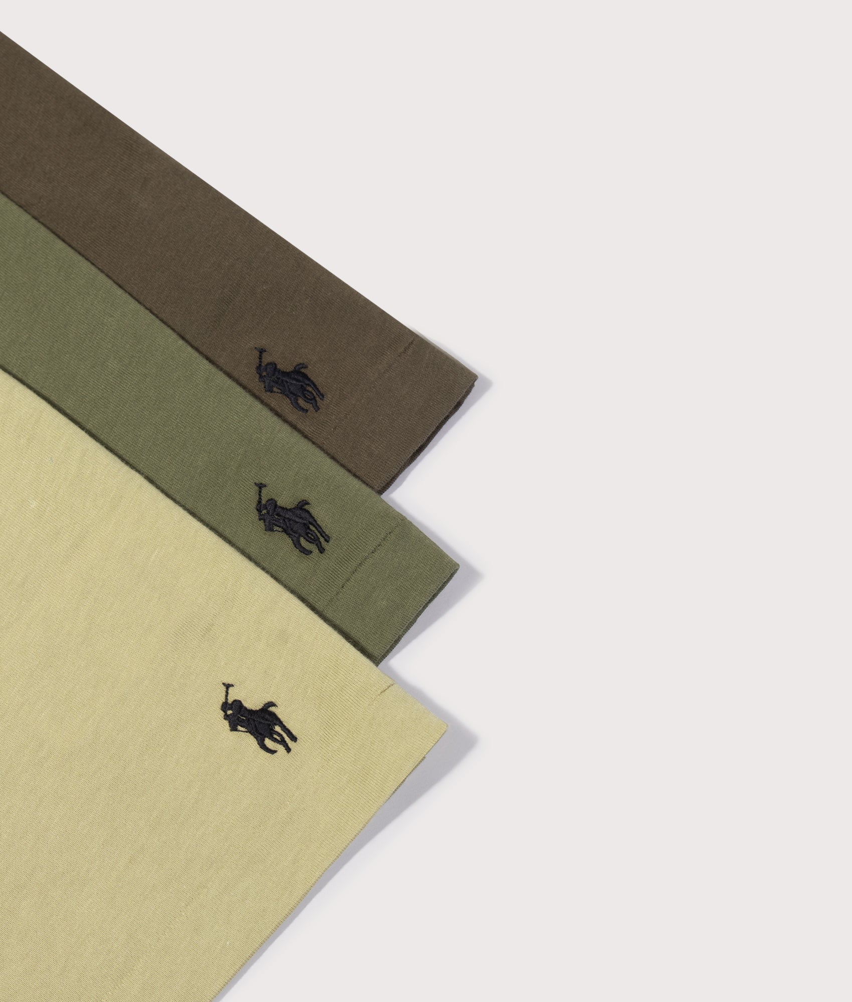 Polo Ralph Lauren Slim Fit 3 Pack crewneck Loungewear T-Shirts in Light Olive, Classic Drab Olive and Defender green at EQVVS Menswear. Detail shot.