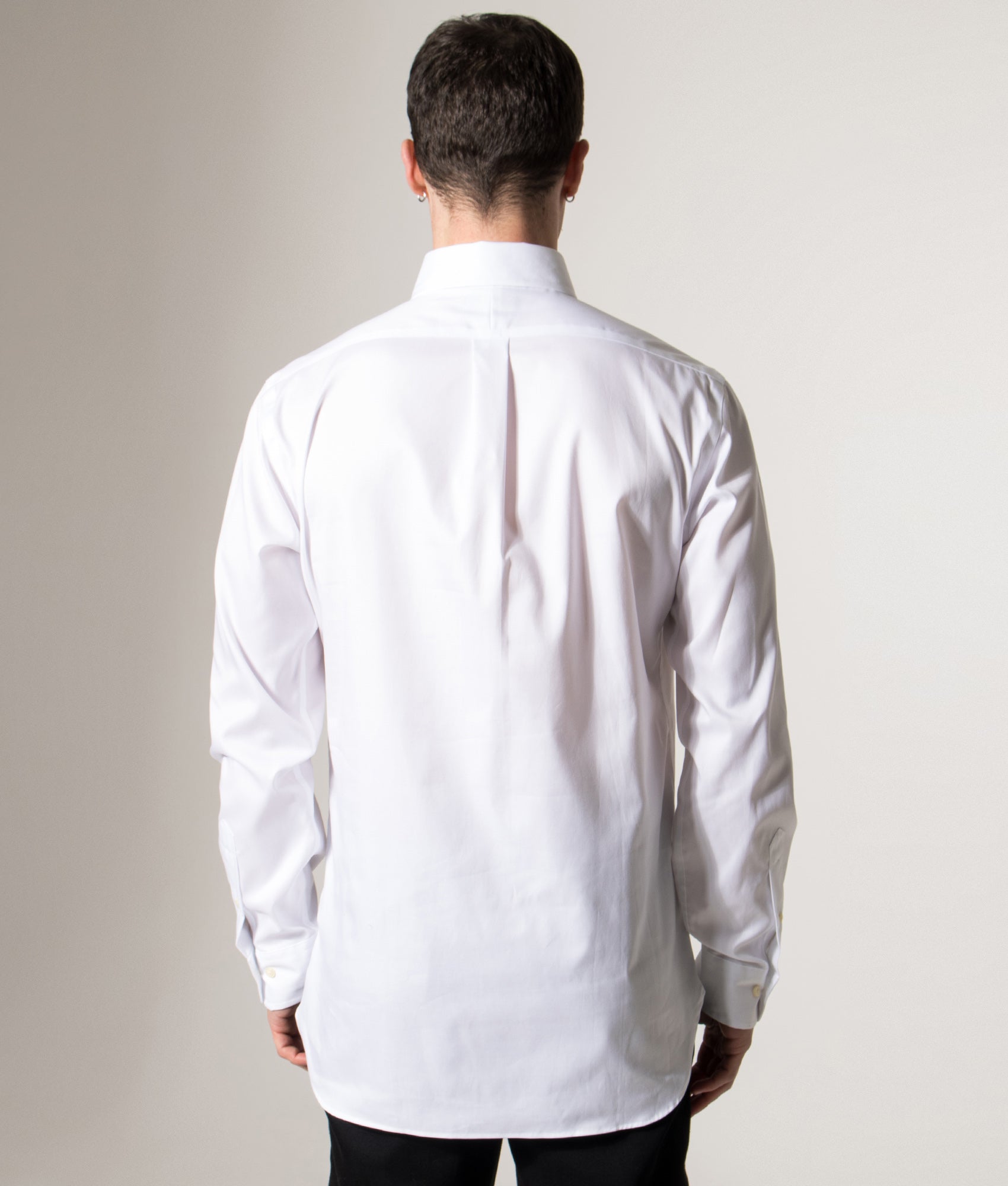 Polo Ralph Lauren Custom Fit Oxford Dress Shirt in White at EQVVS Menswear. Model back shot.
