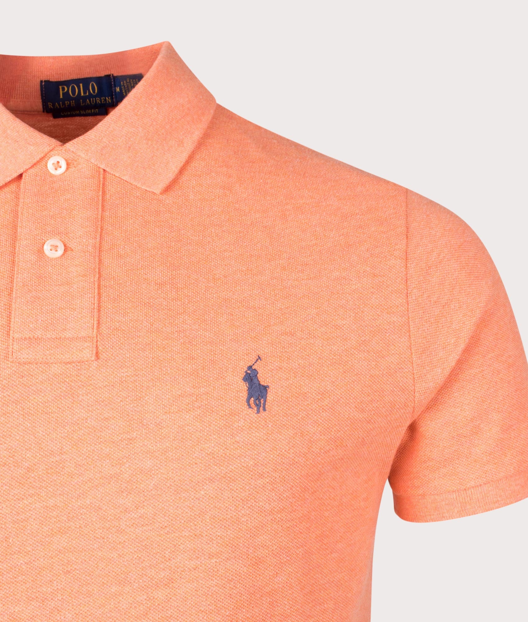 The Iconic Mesh Polo Shirt in Beach Orange Heather by Polo Ralph Lauren. EQVVS Detail Shot.