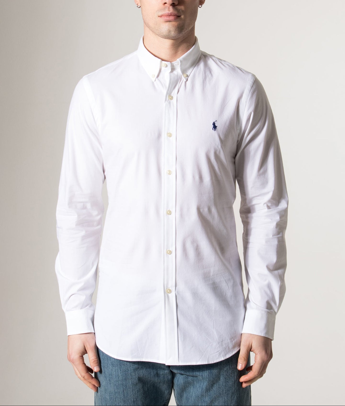 Polo Ralph Lauren Custom Slim Fit Stretch Poplin Shirt in a core white at EQVVS Menswear. Model front shot.