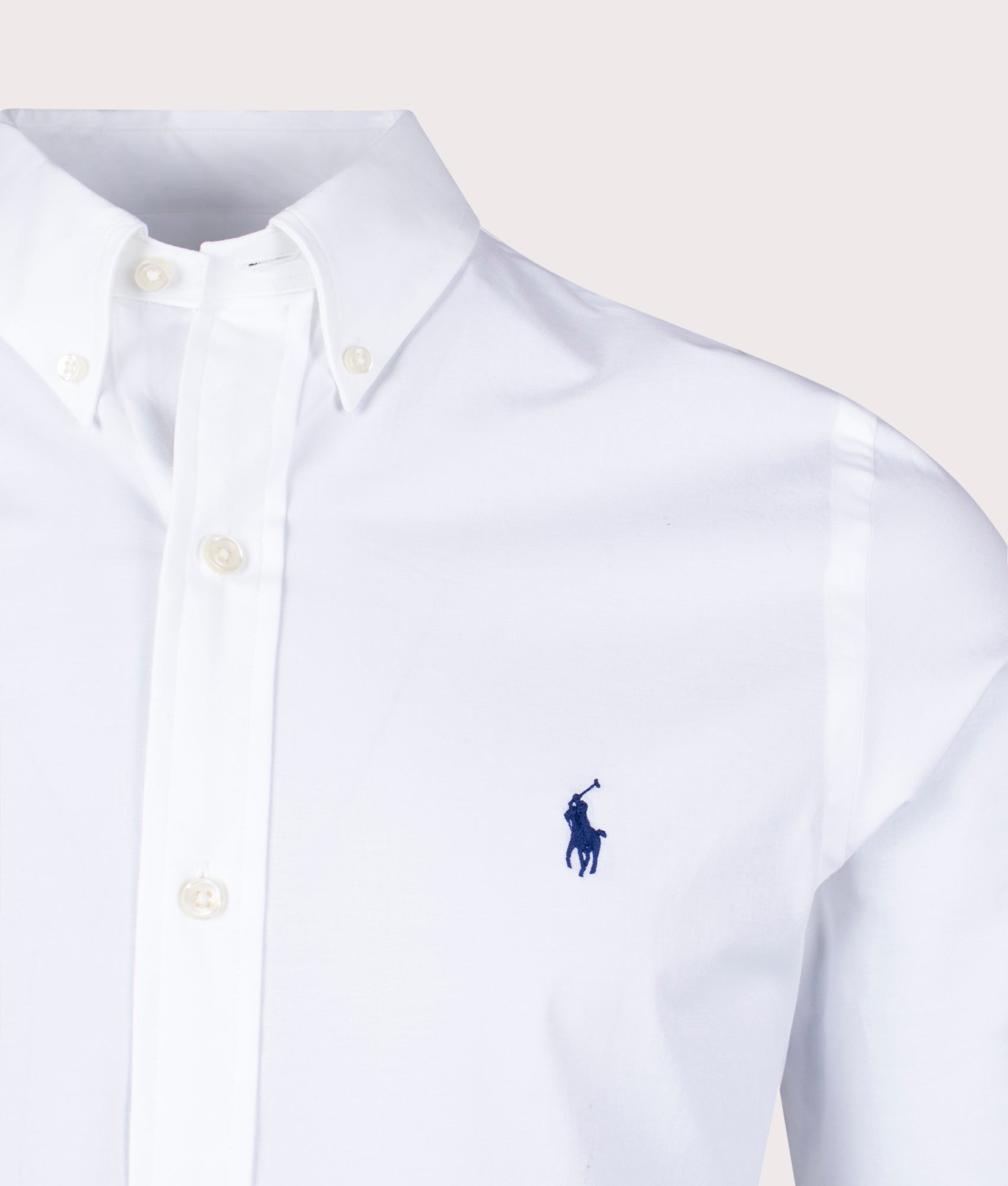 Polo Ralph Lauren Custom Slim Fit Stretch Poplin Shirt in a core white at EQVVS Menswear. Detail shot.