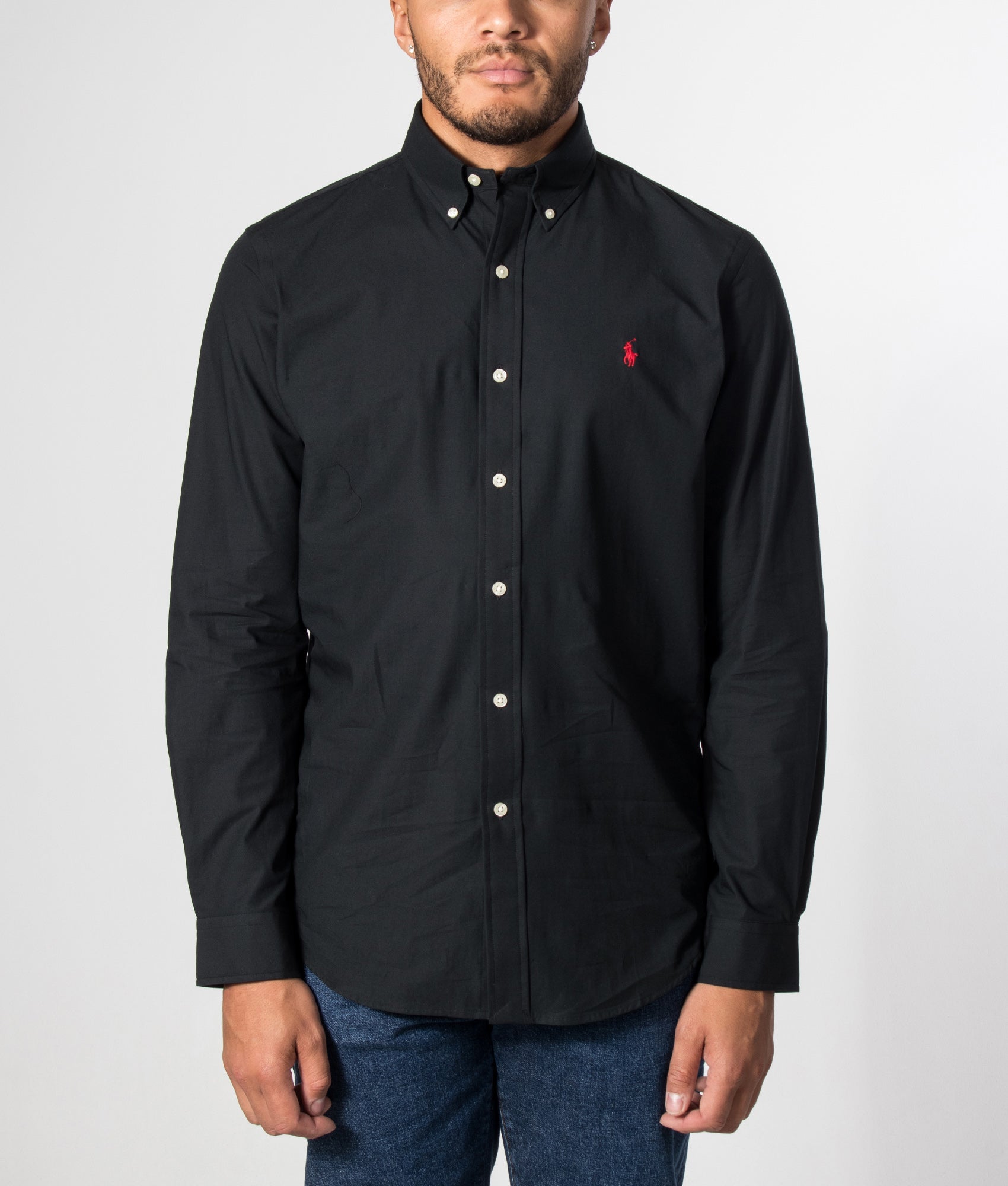 Polo Ralph Lauren Custom Fit stretch poplin Shirt in polo black at EQVVS Menswear. Model front shot.