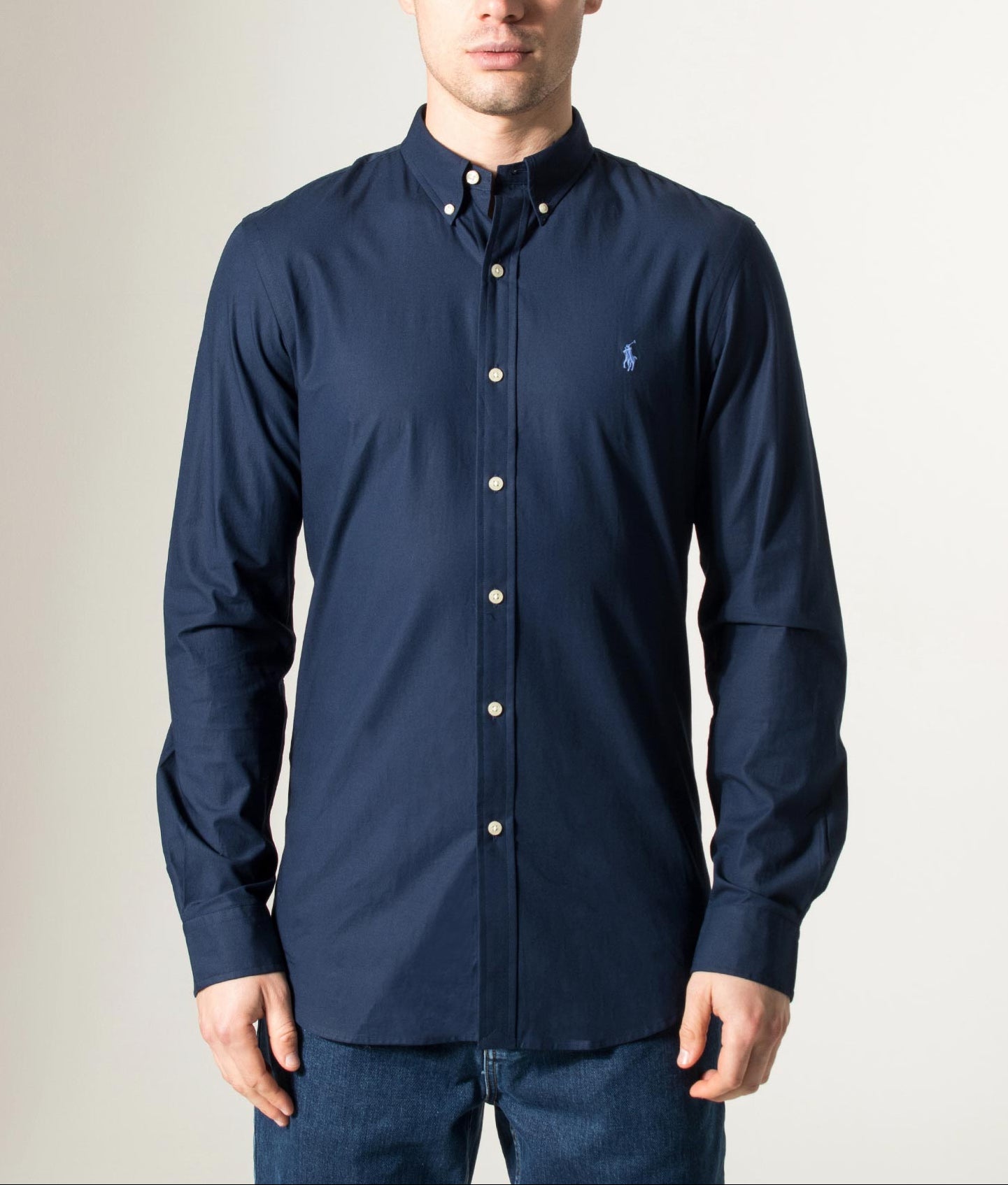 Polo Ralph Lauren Custom Slim Fit Stretch Poplin Shirt in 001 Newport Navy at EQVVS Menswear. Model front shot.