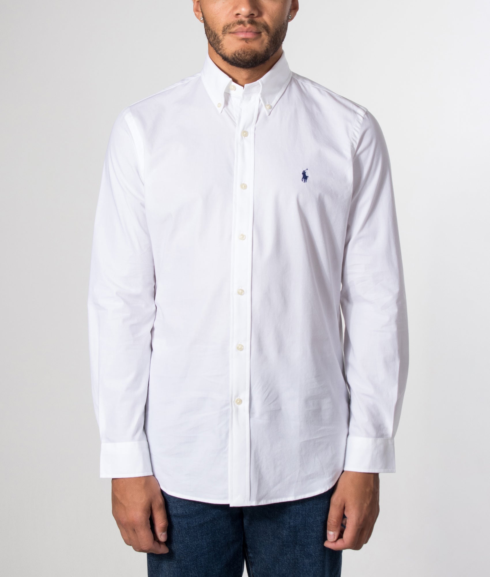 Polo Ralph Lauren Custom Fit stretch poplin Shirt in white at EQVVS Menswear. Model front shot.