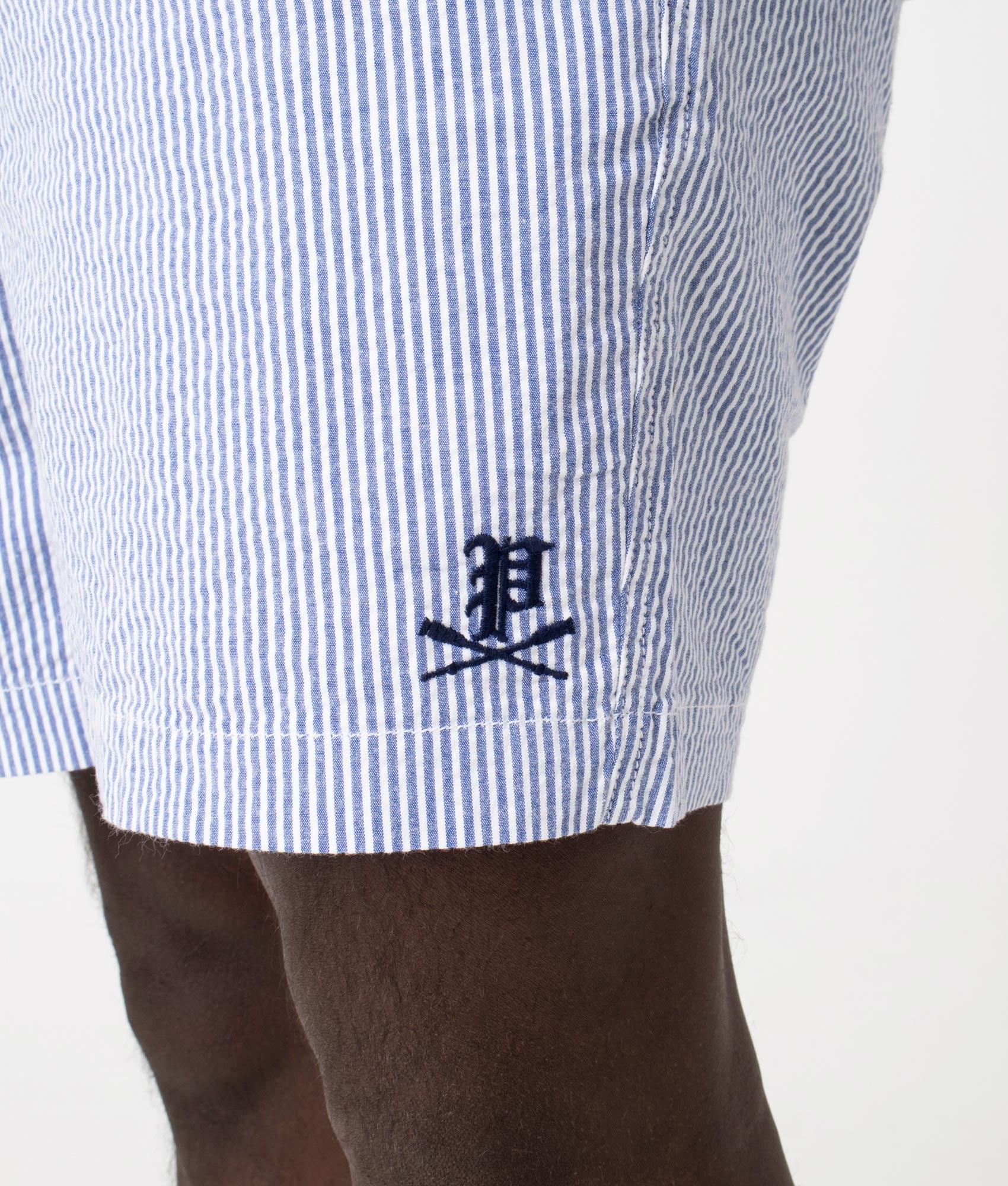 Classic Fit Prepster Seersucker Shorts in Seersucker Blue with Gothic Emblem, Detail Model Shot at EQVVS