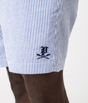 Polo Ralph Lauren Stripey Classic Fit Teill Flat Front Shorts in Seersucker Blue with Gothic Emblem, Detail Model Shot at EQVVS
