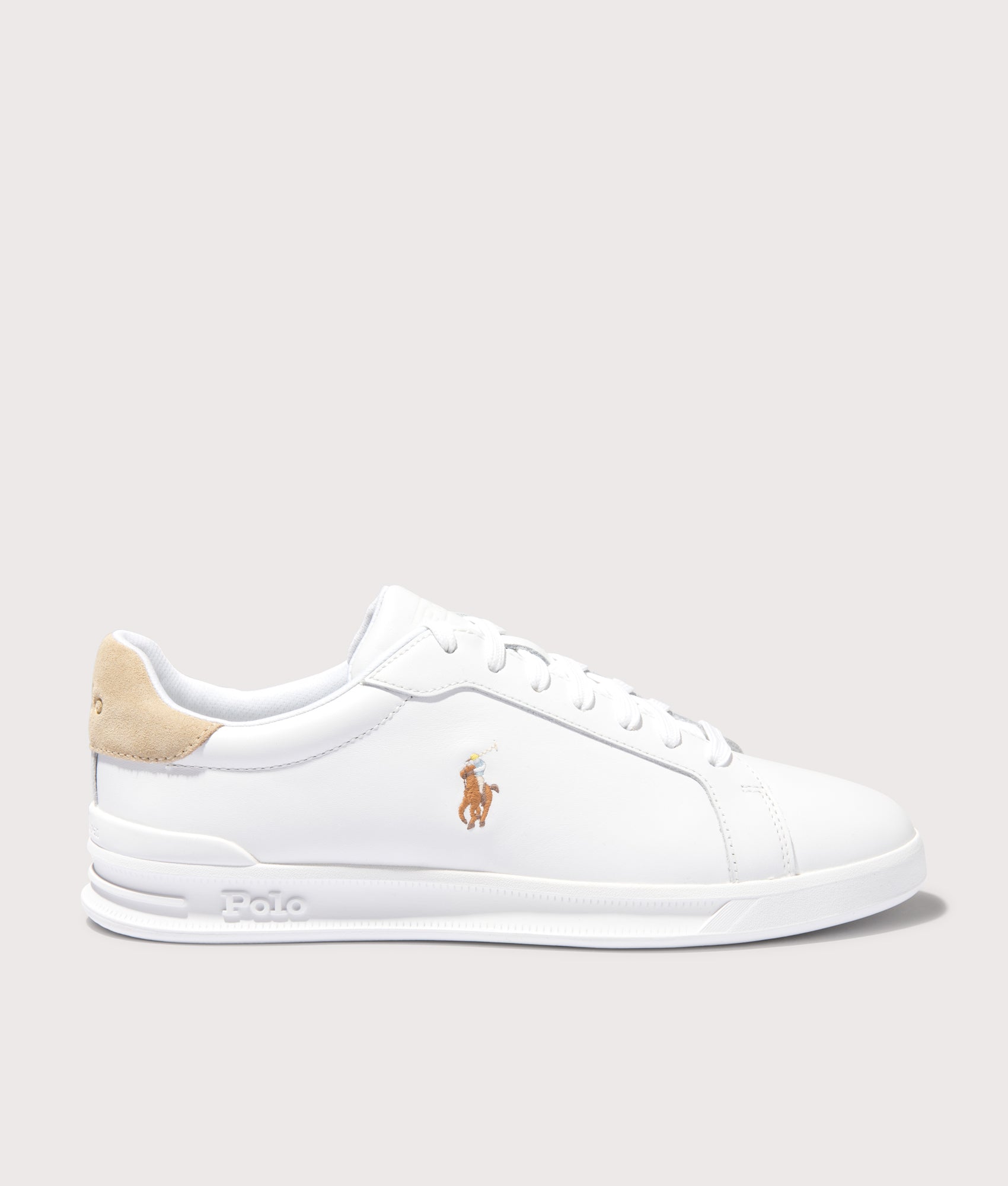 Polo Ralph Lauren Heritage Court II Leather Sneakers in White/Bone. Shot at EQVVS.  Side angle shot. 