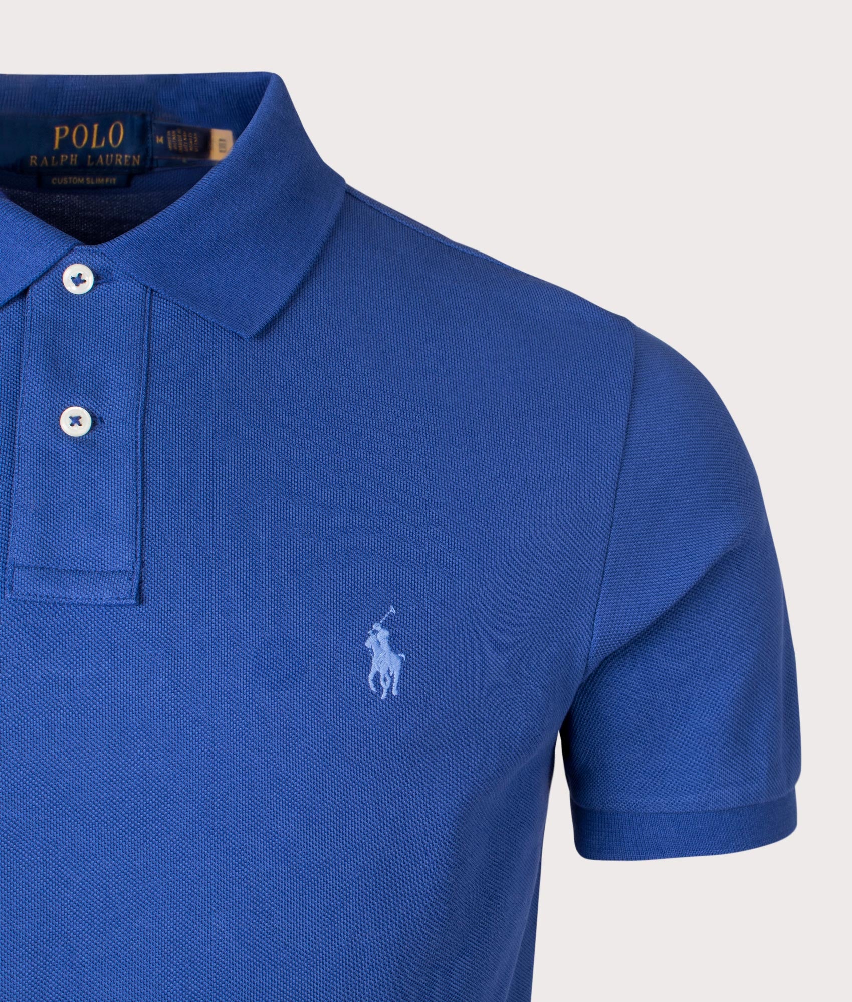 Custom Slim Fit Basic Mesh Polo Shirt in Beach Royal by Polo Ralph Lauren. EQVVS Detail Shot.