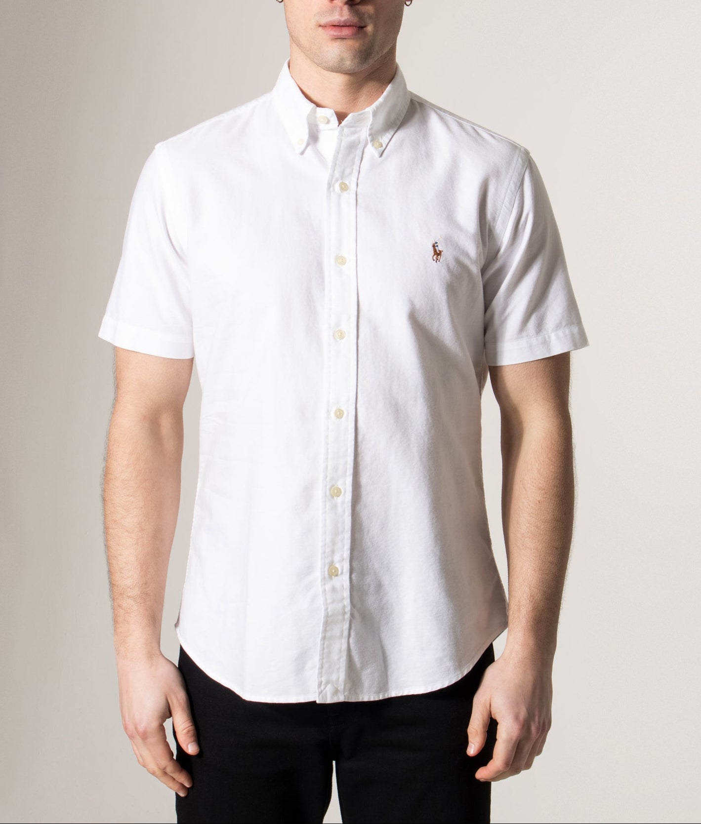 Polo Ralph Lauren Custom Fit Short Sleeve Lightweight Oxford Shirt in Bsr White at EQVVS Menswear. Model front shot.