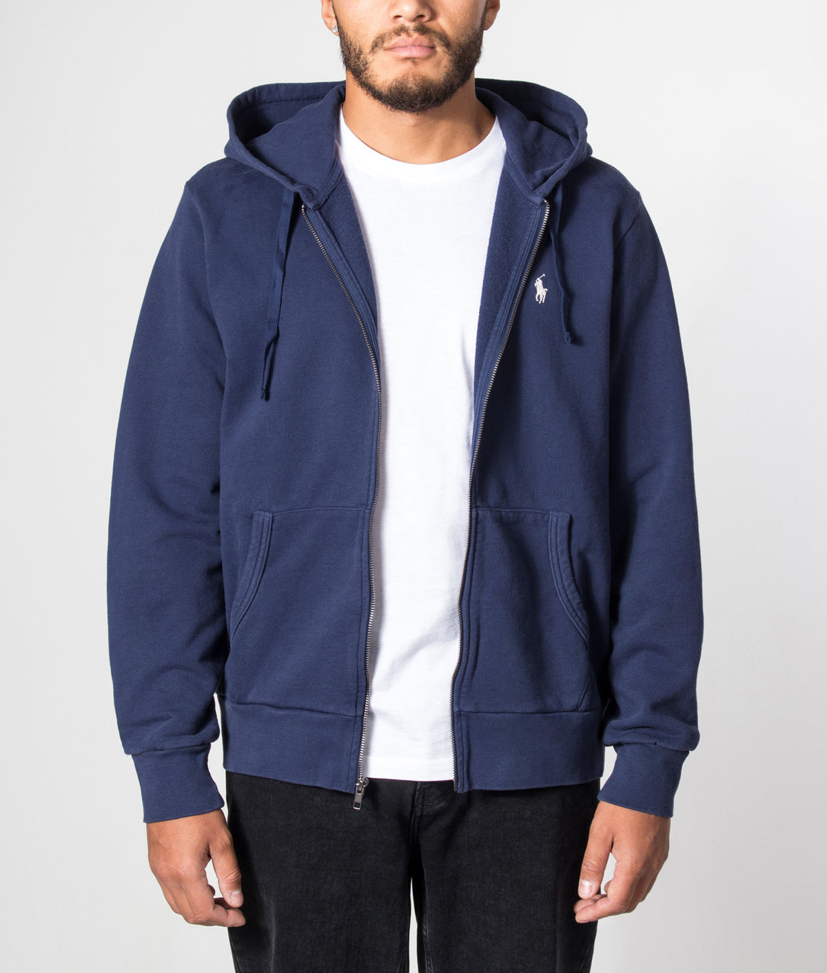 Polo Ralph Lauren Zip Through Loopback Fleece Hoodie in Cruise Navy at EQVVS Menswear. Model front shot.