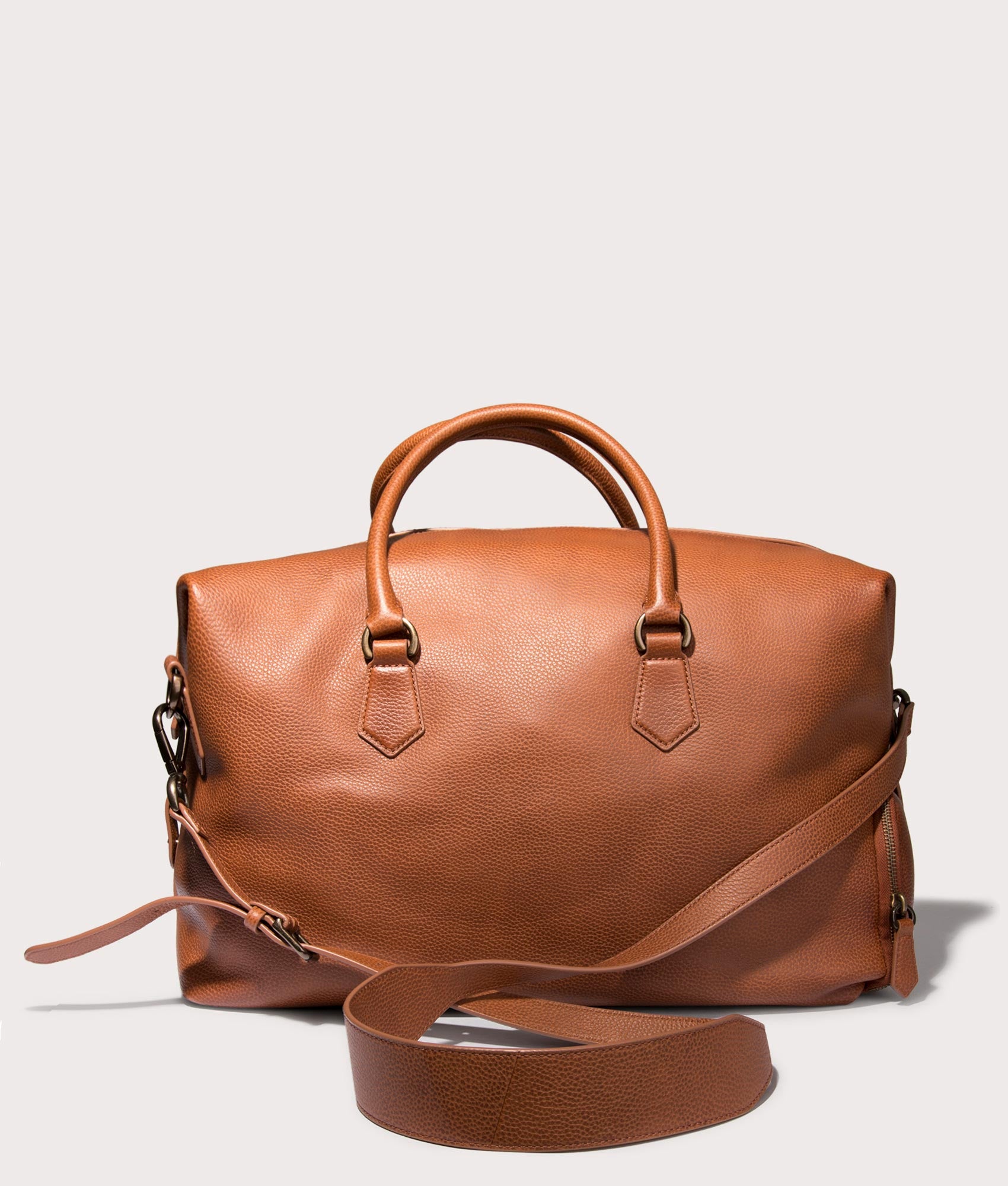 Polo Ralph Lauren Pebbled Leather Duffel Bag in Saddle . Shot at EQVVS. Back shot 