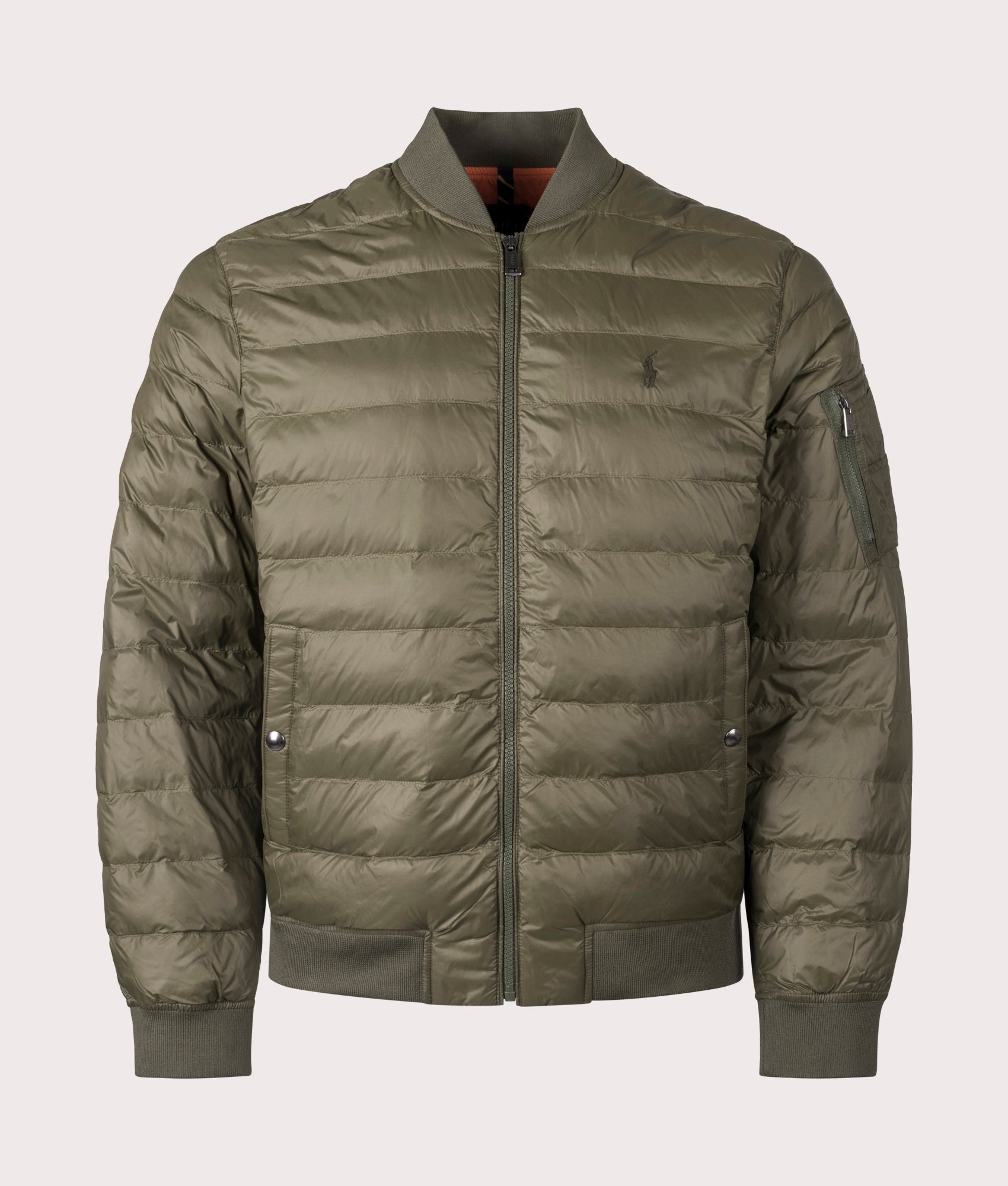 The Colden Packable Bomber Jacket in Canopy Olive from Polo Ralph Lauren. Front angle shot at EQVVS.