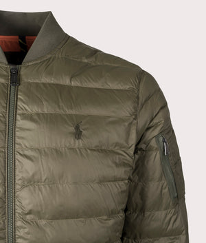The Colden Packable Bomber Jacket in Canopy Olive from Polo Ralph Lauren. Detail angle shot at EQVVS.