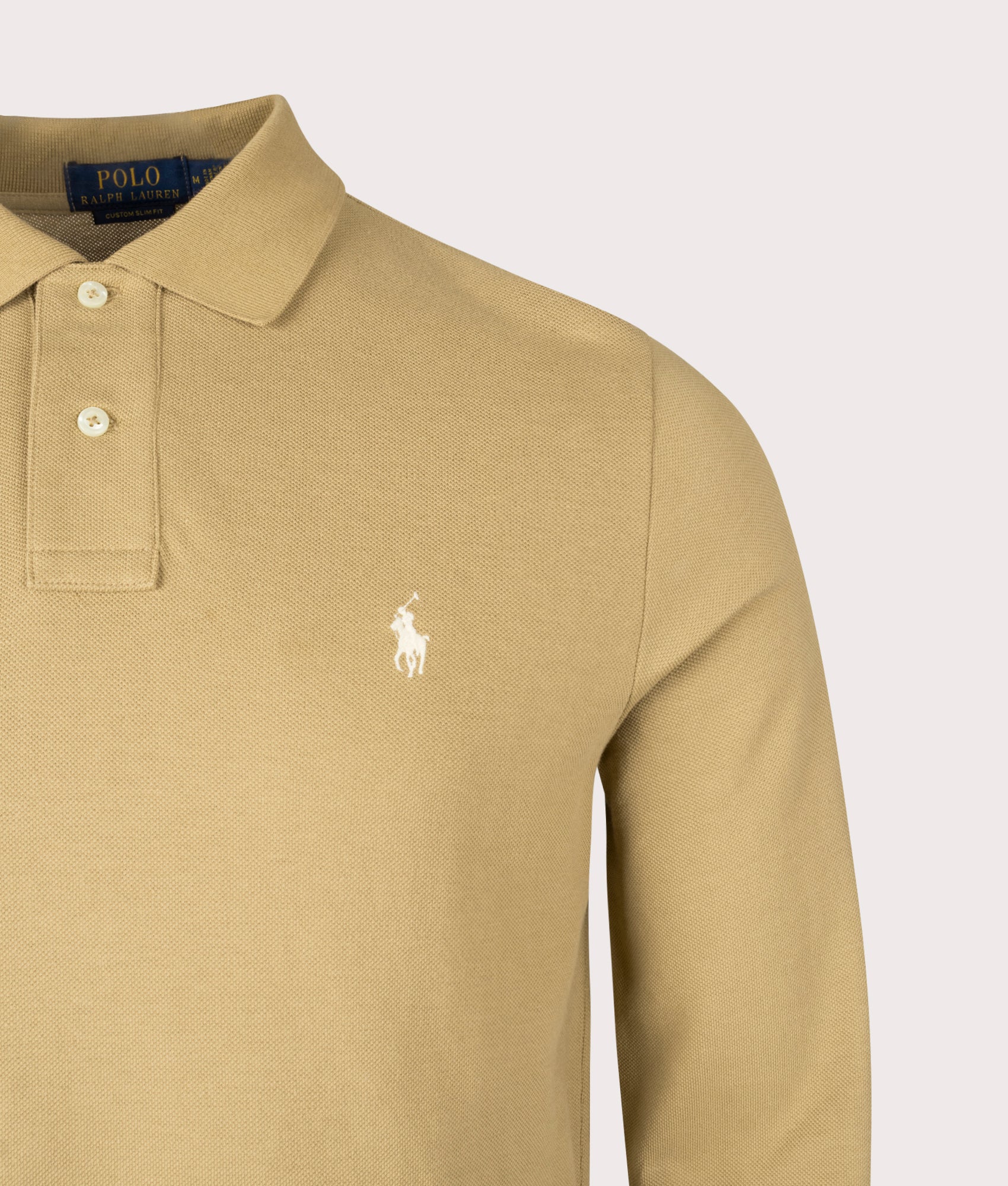 Custom Slim Fit Long Sleeve Polo Shirt by Polo Ralph Lauren in Café Tan . Shot by EQVVS. Detail shot.