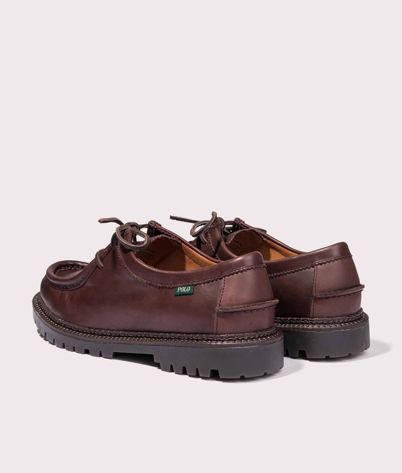 Polo Ralph Lauren Jett Lug-Sole Leather Moc-Toe Shoes in dark brown at EQVVS  Menswear. Angled back shot.