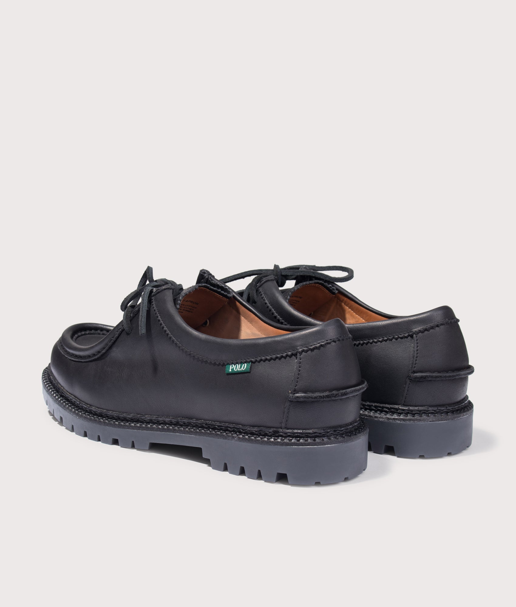 Polo Ralph Lauren Jett Lug-Sole Leather Moc-Toe Shoes in Black at EQVVS Menswear. Back shot.