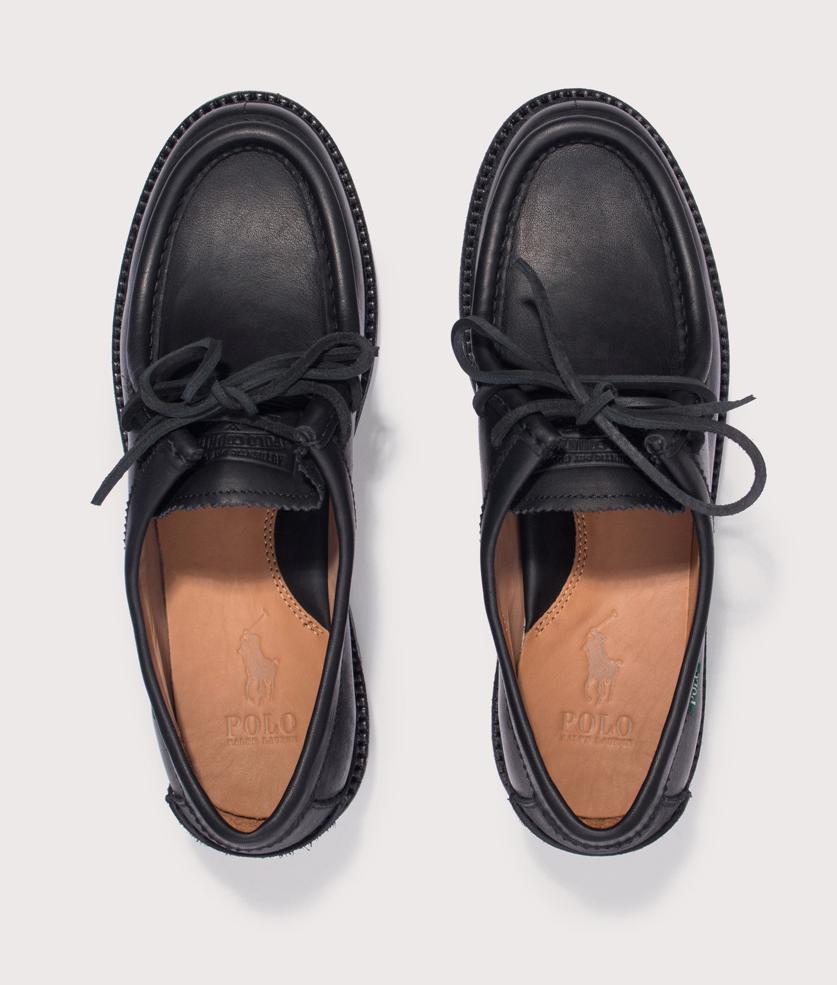 Polo Ralph Lauren Jett Lug-Sole Leather Moc-Toe Shoes in Black at EQVVS Menswear. Top shot.