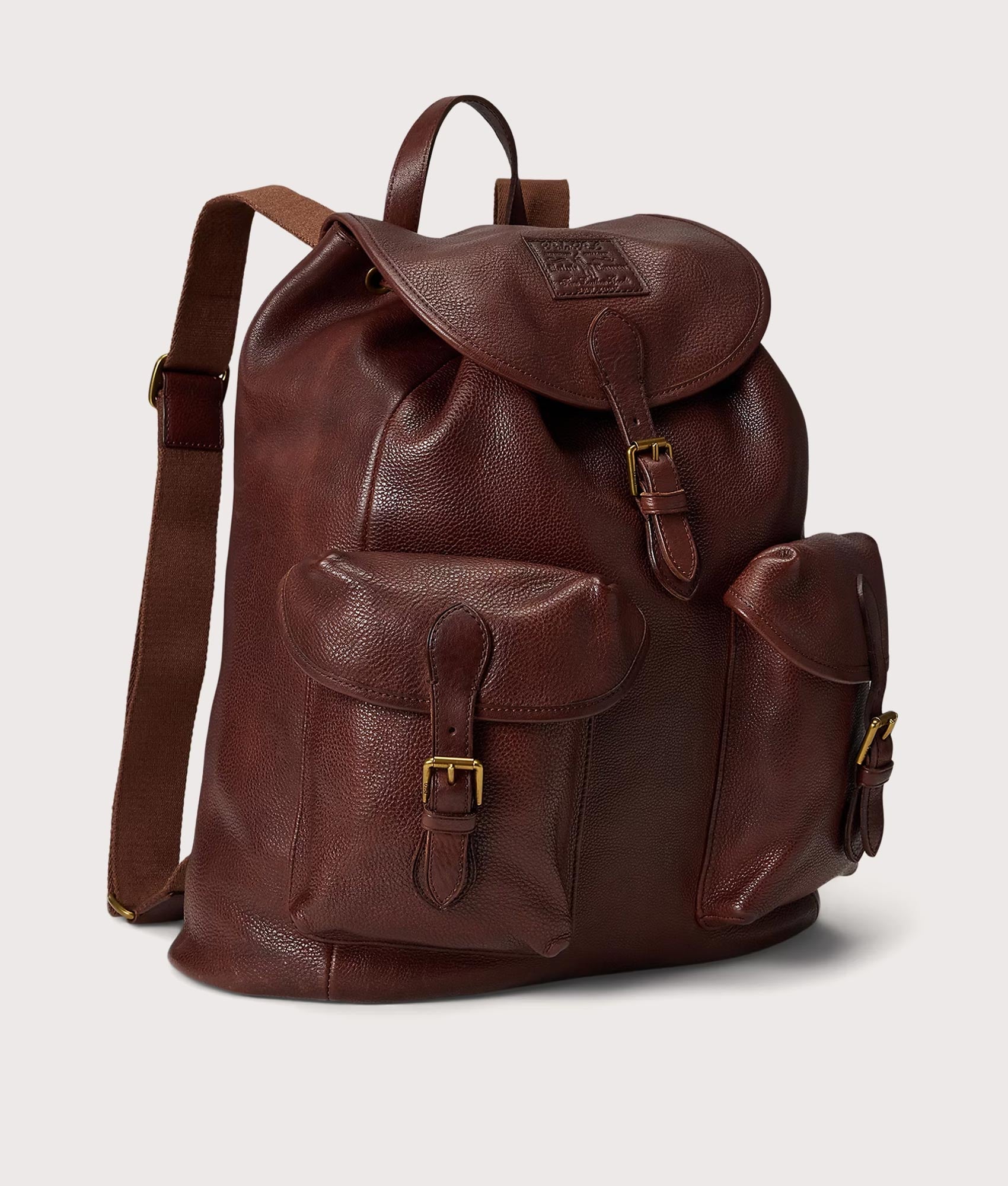 Polo Ralph Lauren Heritage Leather Backpack in British Tan at EQVVS Menswear. Angled front shot. 