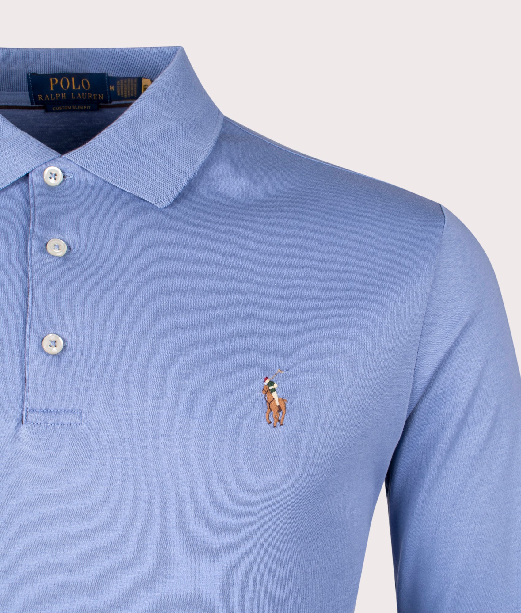 Polo Ralph Lauren Custom Slim Fit Long Sleeve Soft Cotton Polo Shirt in Campus Blue. Detail angle shot at EQVVS.