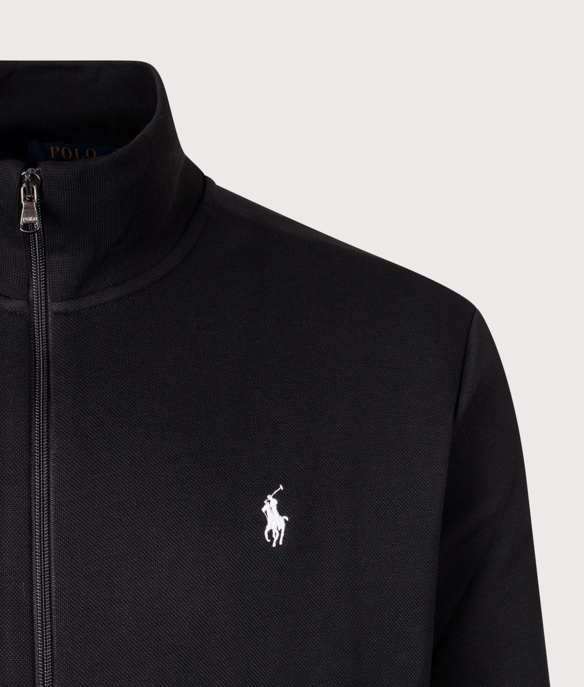 Polo Ralph Lauren Regular Fit Double Knit Track Top in Polo Black at EQVVS Menswear. Detail shot.