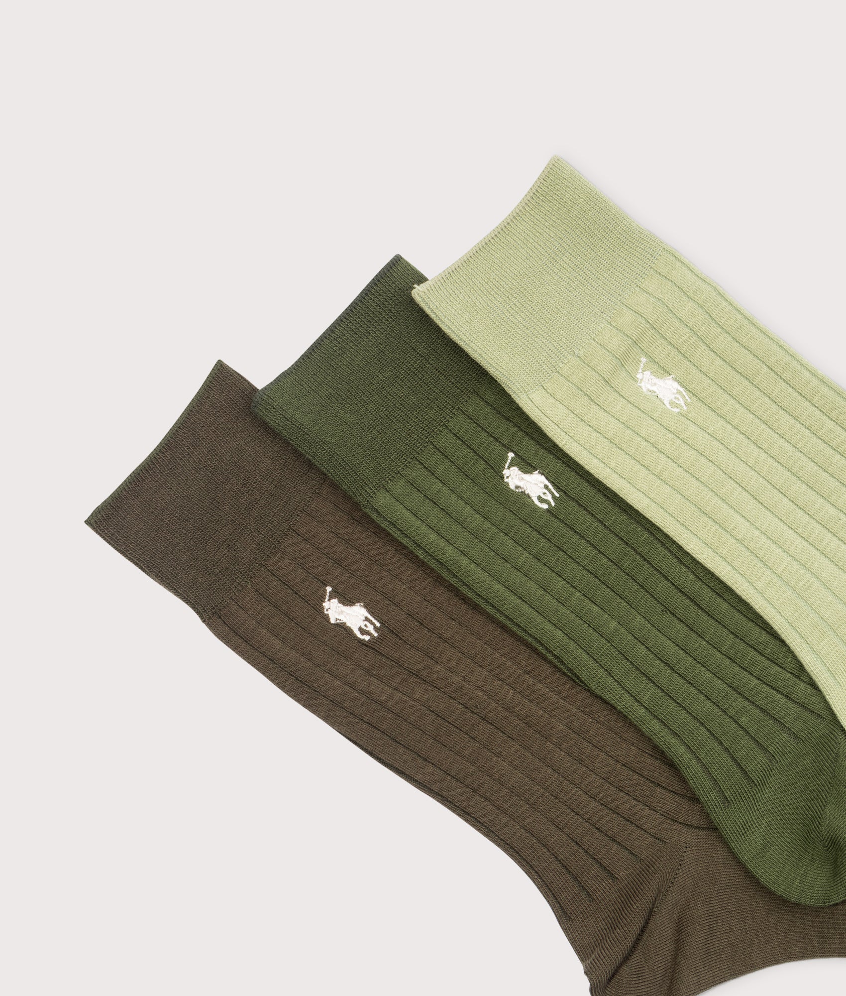 Polo Ralph Lauren 3 Pack Ribbed Cotton-blend Socks in assorted olive at EQVVS Menswear. Detail shot.