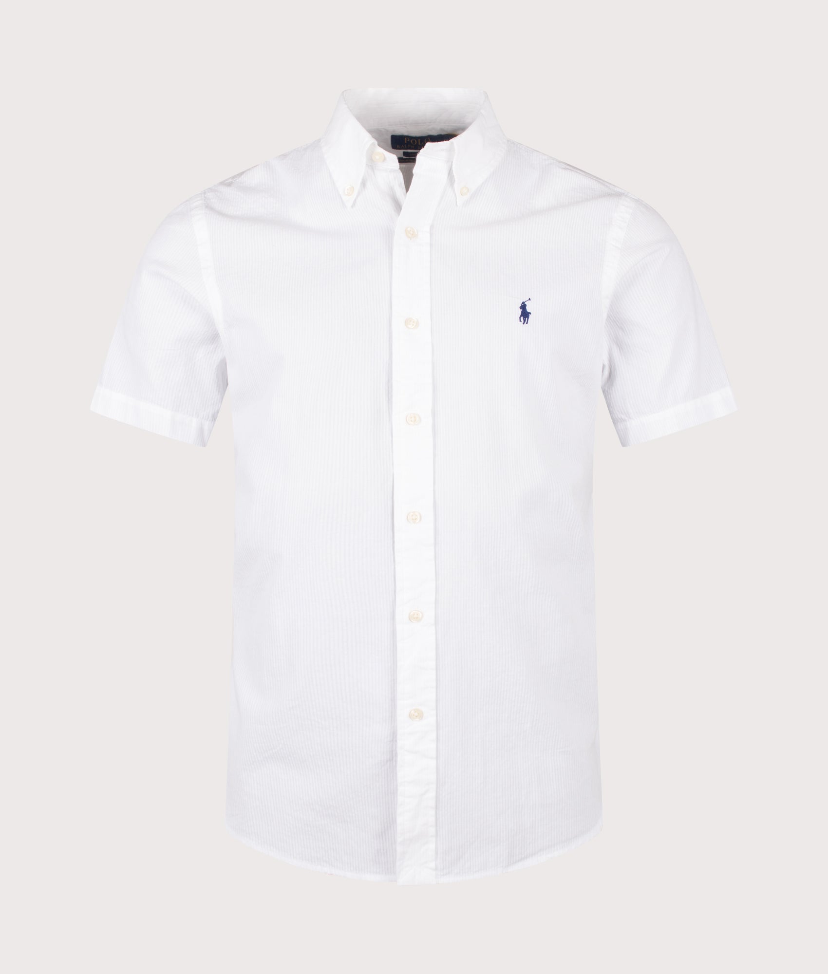 Polo Ralph Lauren Custom Fit Short Sleeve Seersucker Shirt in White at EQVVS Menswear. Front shot.