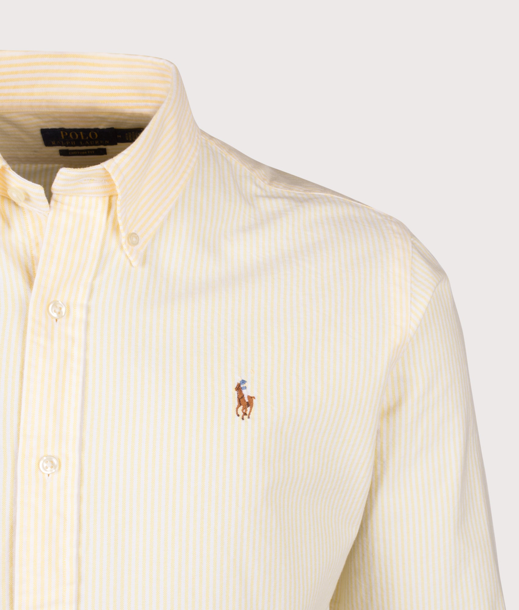 Polo Ralph Lauren Custom Fit Striped Oxford Shirt in Yellow Oxford and White at EQVVS Menswear. Detail shot.