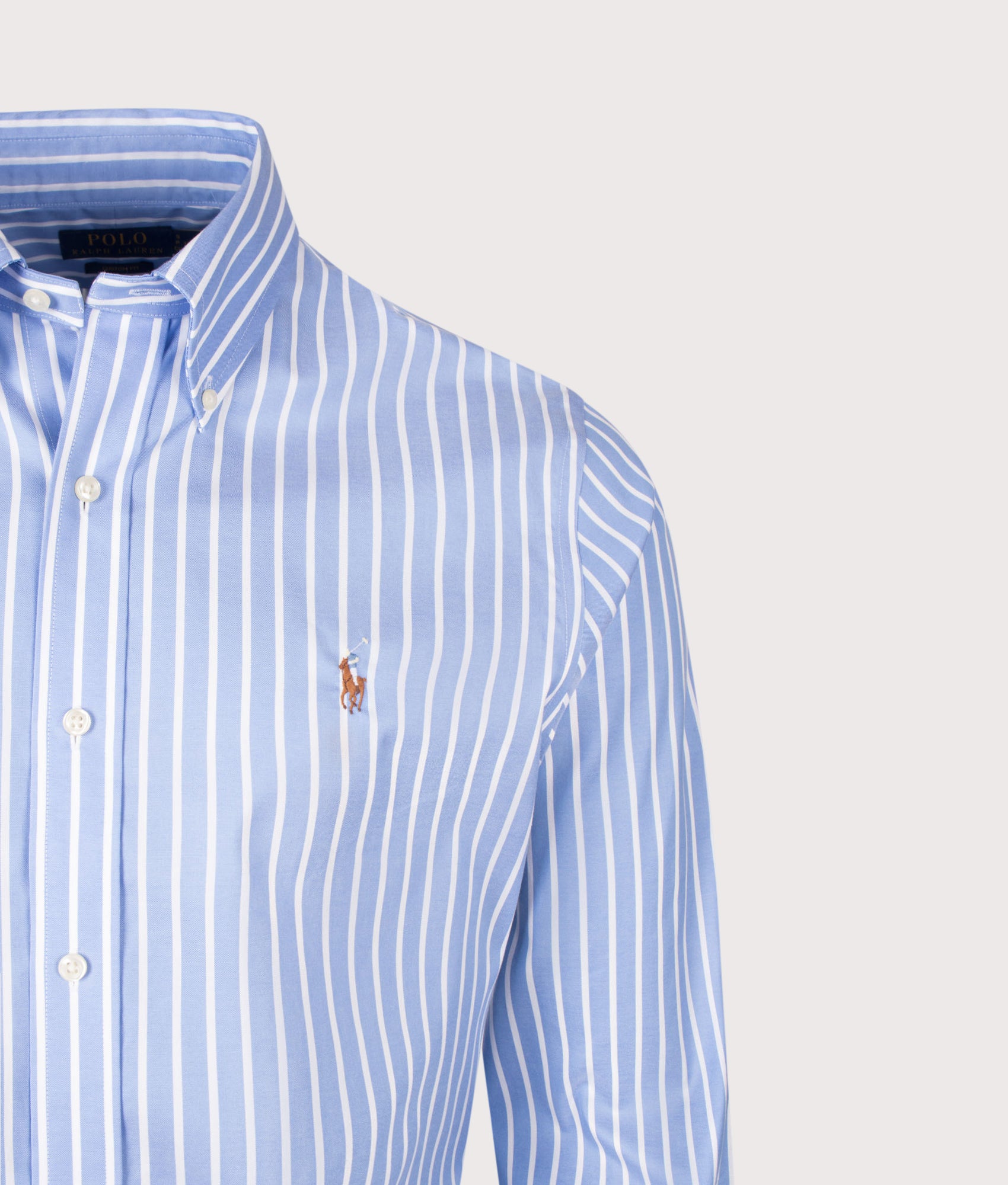 Polo Ralph Lauren Custom Fit Striped Pinpoint Oxford Shirt in Blue and White at EQVVS Menswear. Detail shot.