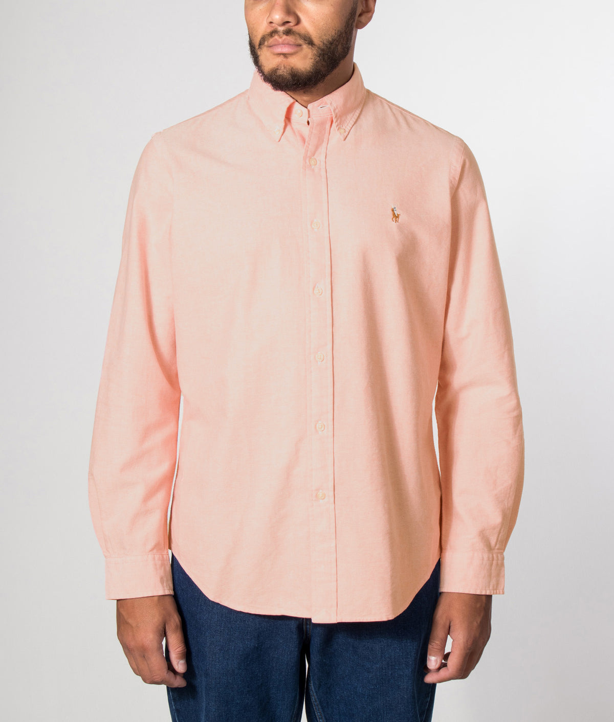 Polo Ralph Lauren Custom Fit Iconic Oxford Shirt in Kona Orange at EQVVS Menswear. Model front shot.