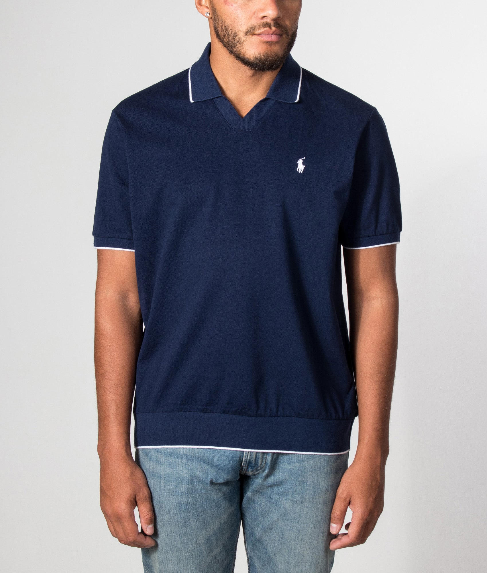Polo Ralph Lauren Jacquard Mesh Polo Shirt in Newport Navy at EQVVS Menswear. Model front shot.