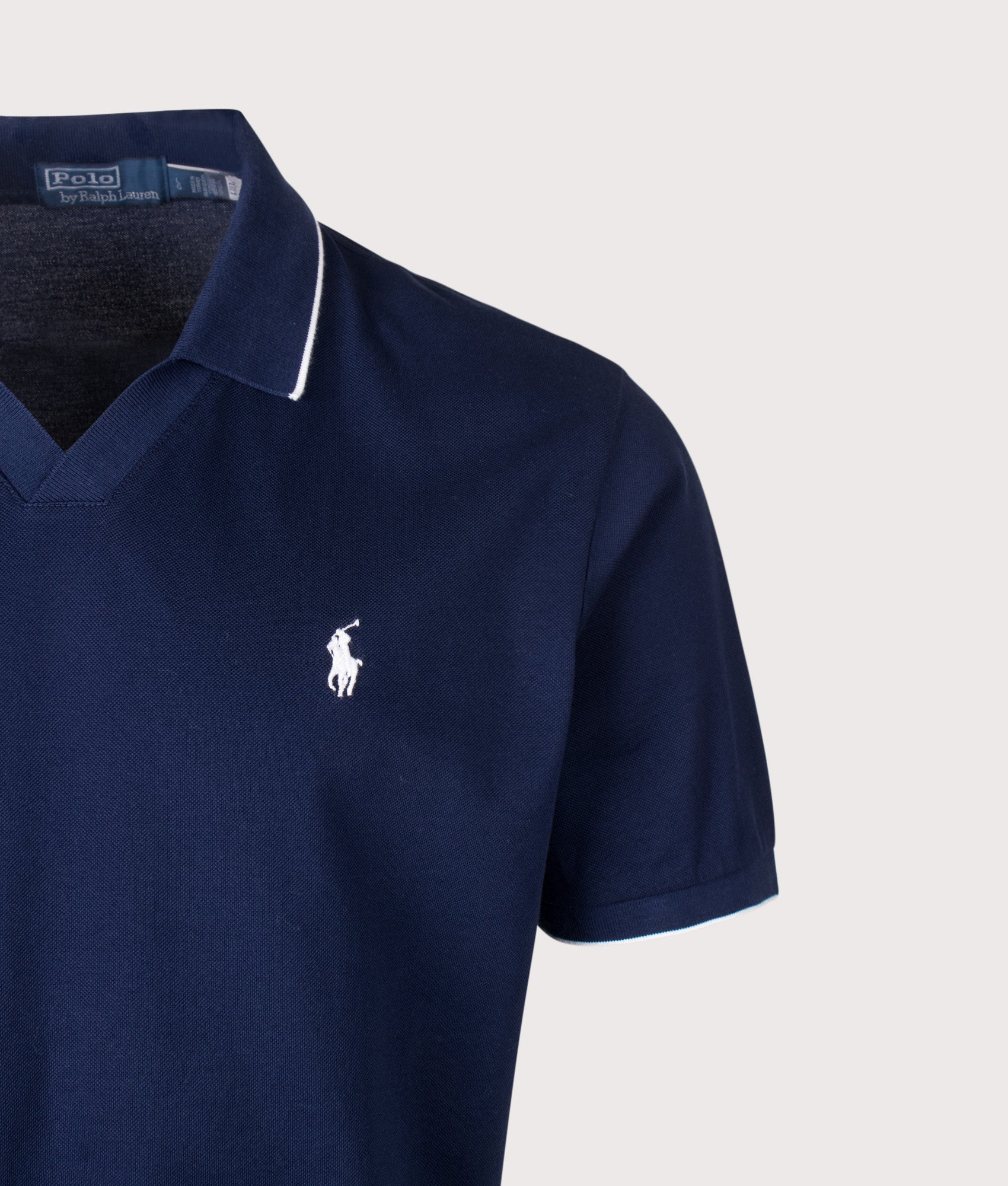 Polo Ralph Lauren Jacquard Mesh Polo Shirt in Newport Navy at EQVVS Menswear. Detail shot.