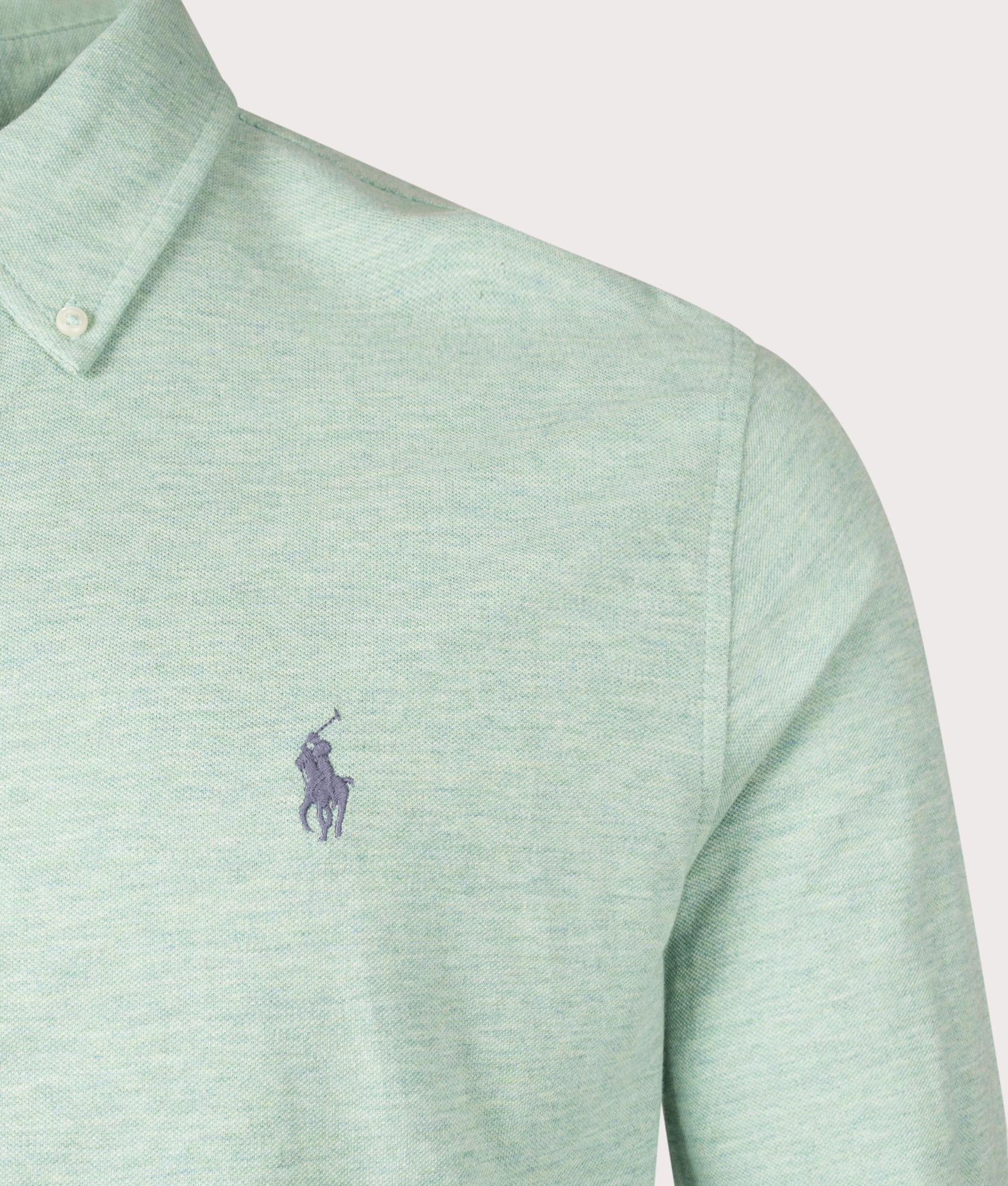 Polo Ralph Lauren Relaxed Fit Featherweight Mesh Shirt in Celadron Heather green. Detail Shot.