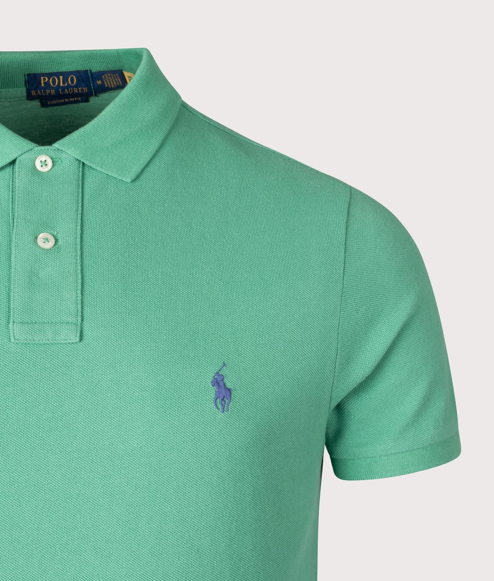 Custom Slim Fit Mesh Polo Shirt. Shot by EQVVS. Front detail shot.
