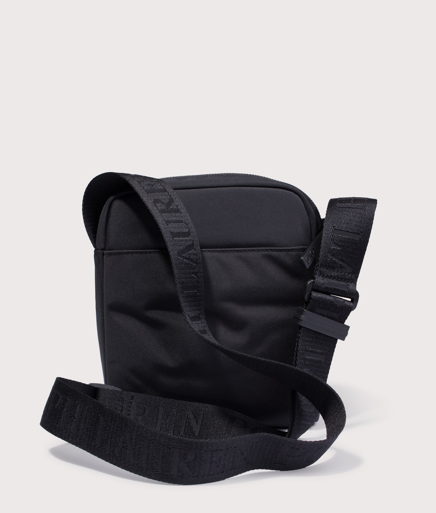 Polo Ralph Lauren Tonal Logo Crossbody bag in Black at EQVVS Menswear. Back shot.