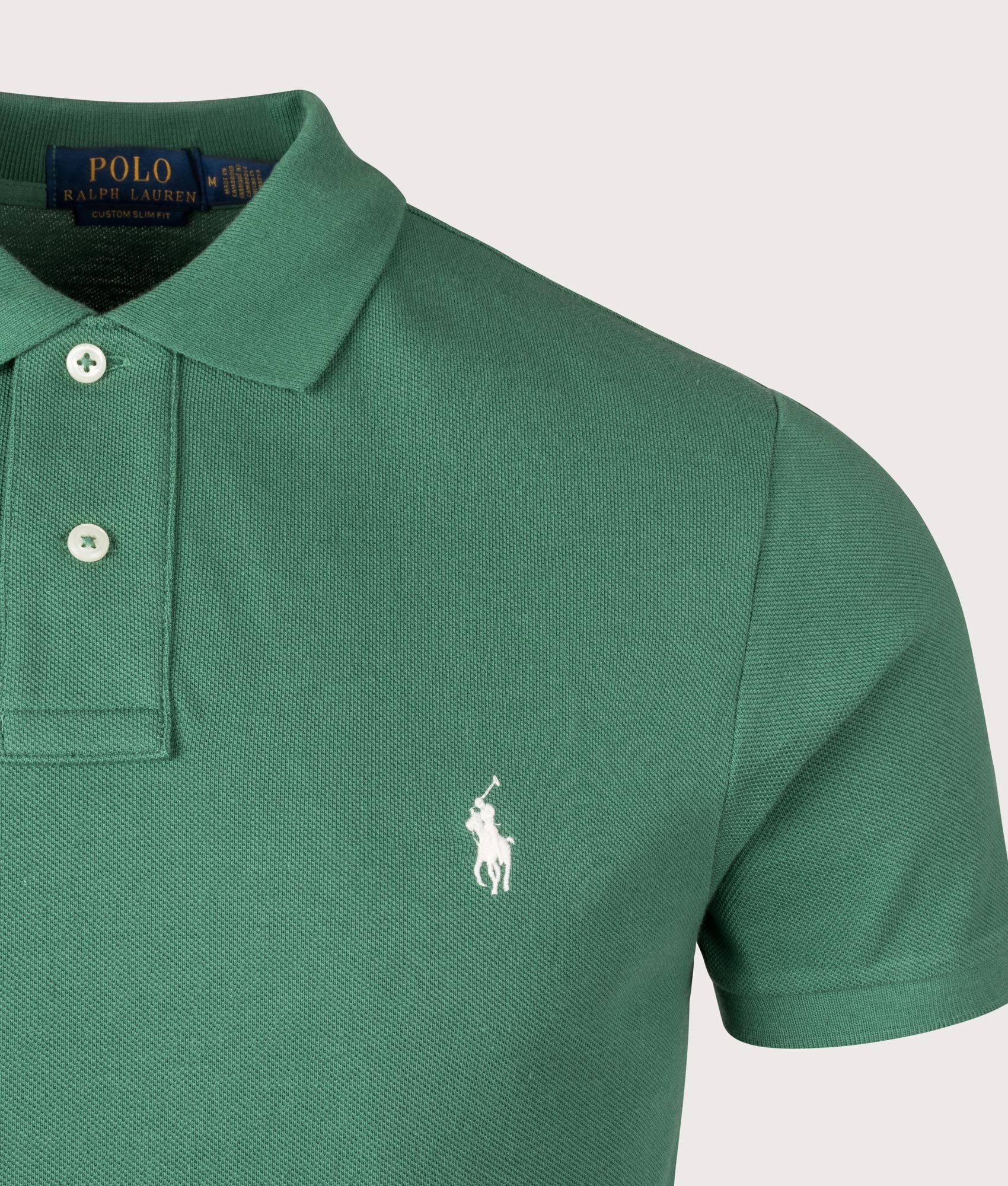 Polo Ralph Lauren Custom Slim Fit Mesh Polo Shirt in Vibrant Antique Green at EQVVS Menswear. Detail shot.