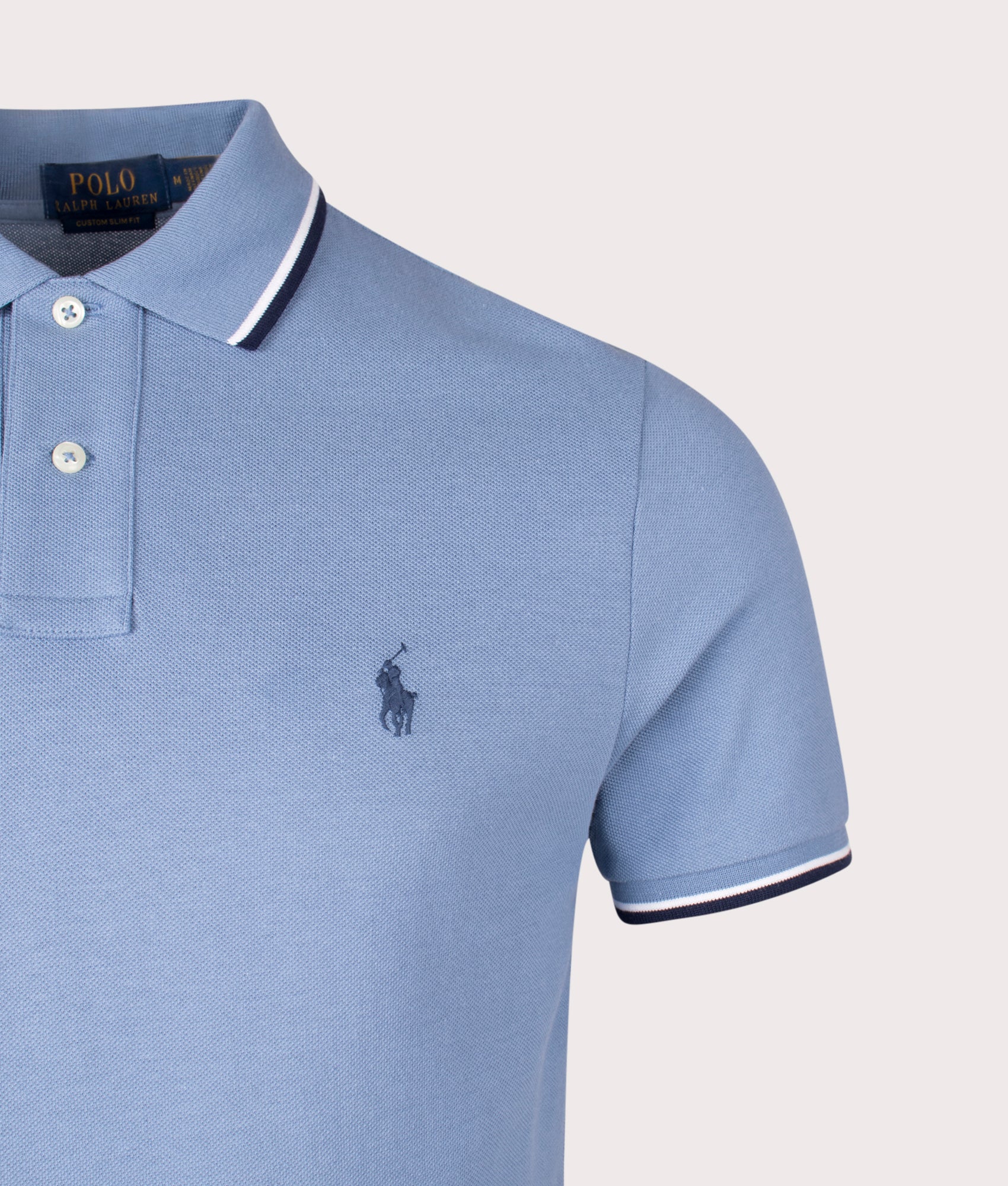 Custom Slim Fit Mesh Polo Shirt by Polo Ralph Lauren in Channel Blue. Shot by EQVVS. Detail shot.
